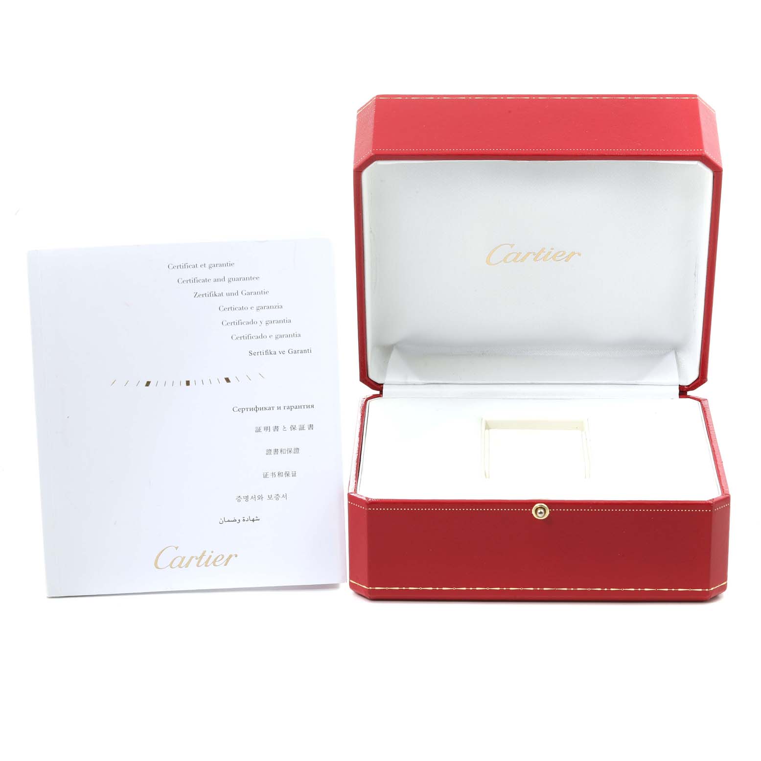 This image shows the open box and guarantee booklet for the Calibre de Cartier watch by Cartier.