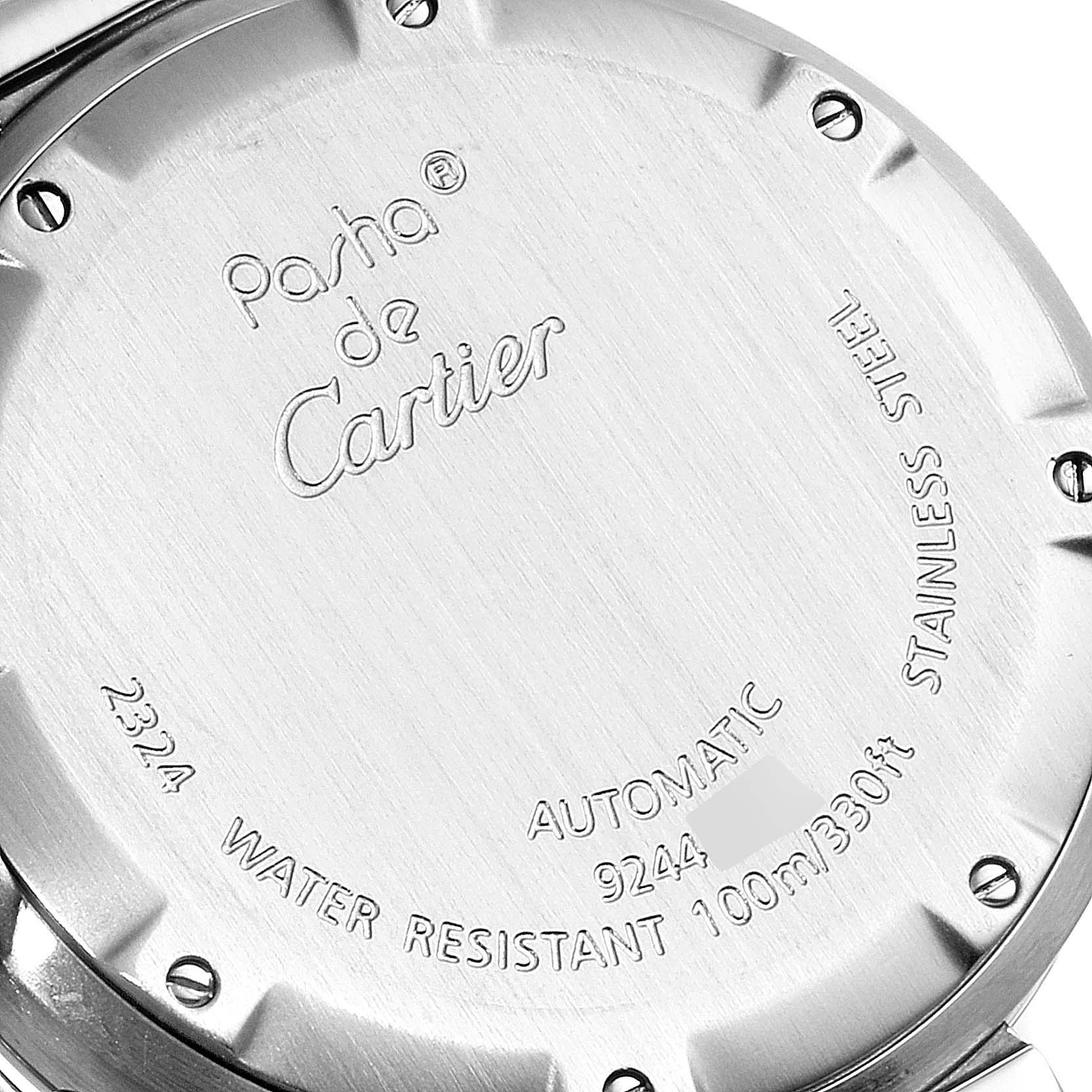 This image shows the back case of the Pasha de Cartier watch, highlighting details like model numbers, water resistance, and material.