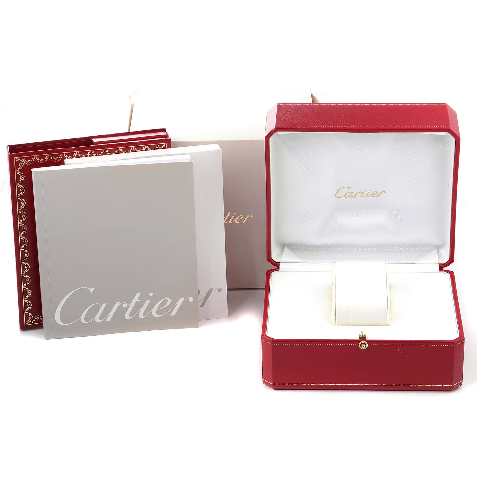 This image shows an open Cartier Pasha W31053M7 Men's Stainless Steel Black Dial W31053M7 Men's Stainless Steel Black Dial watch box with accompanying manuals and packaging.