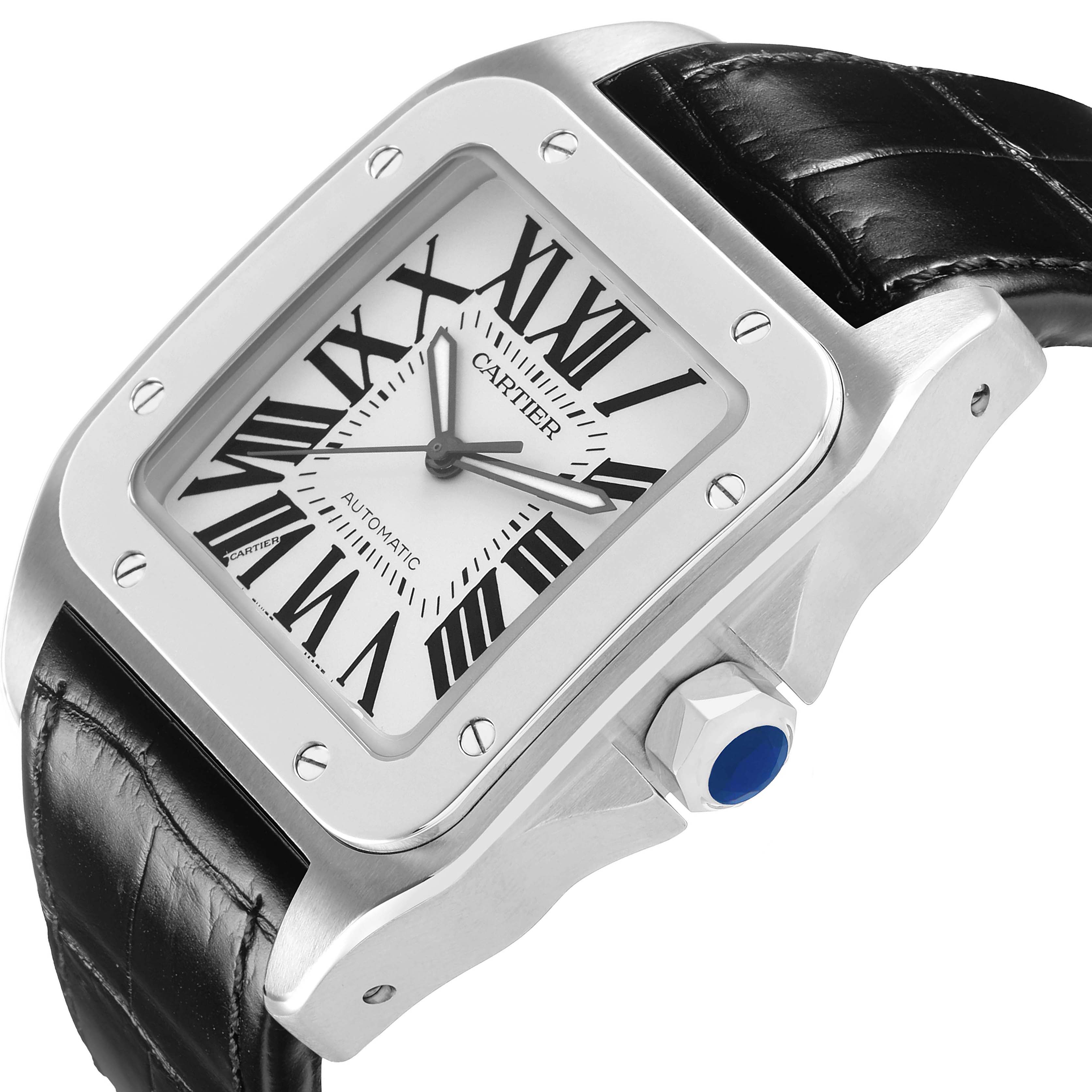 The Cartier Santos W20073X8 Men's Stainless Steel Silver Dial watch is shown from a diagonal angle, highlighting its face, bezel, crown, and leather strap.