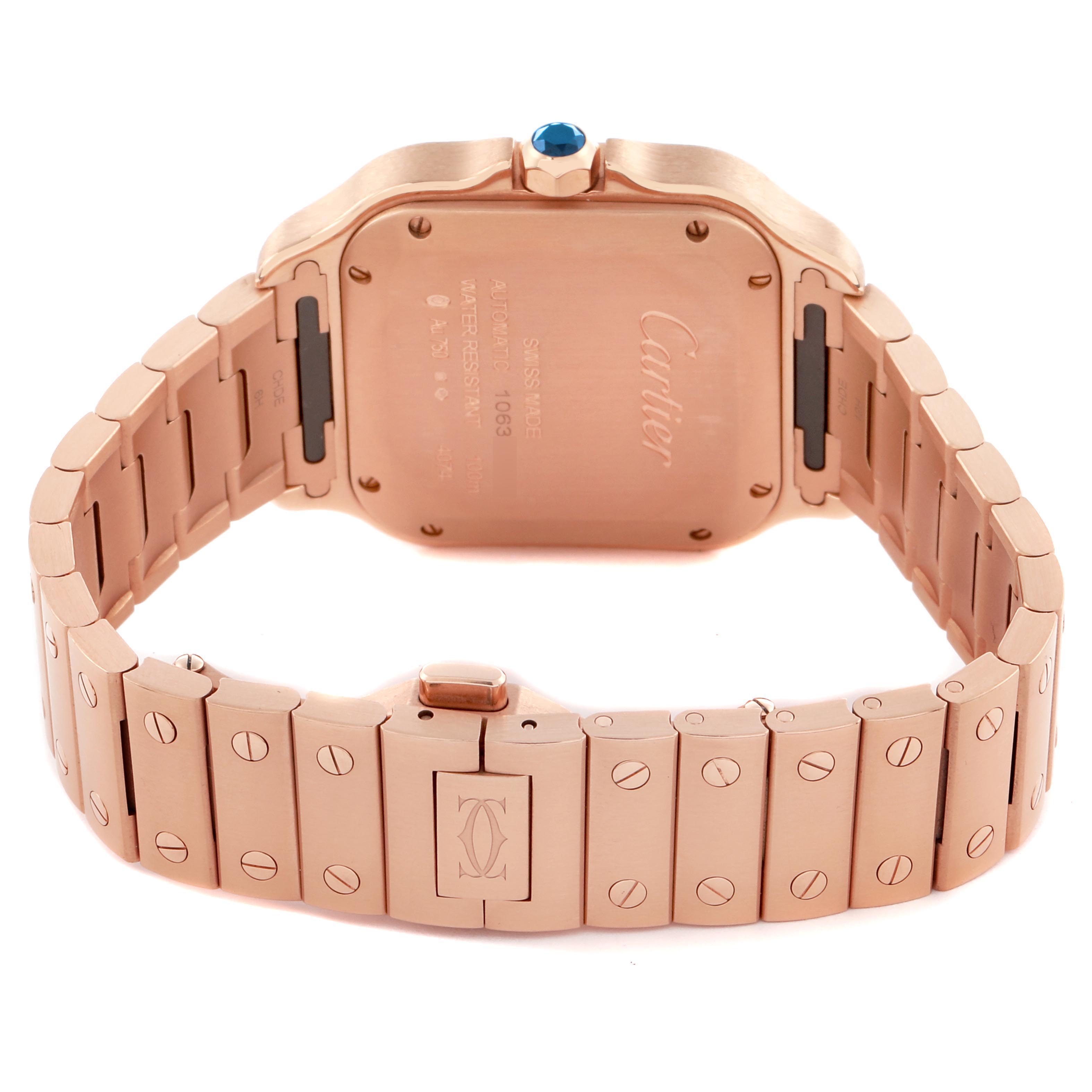 The image shows the back and bracelet of a Cartier Santos WGSA0031 Men's Rose Gold Silver Dial WGSA0031 Men's Rose Gold Silver Dial watch, highlighting the case back and clasp.
