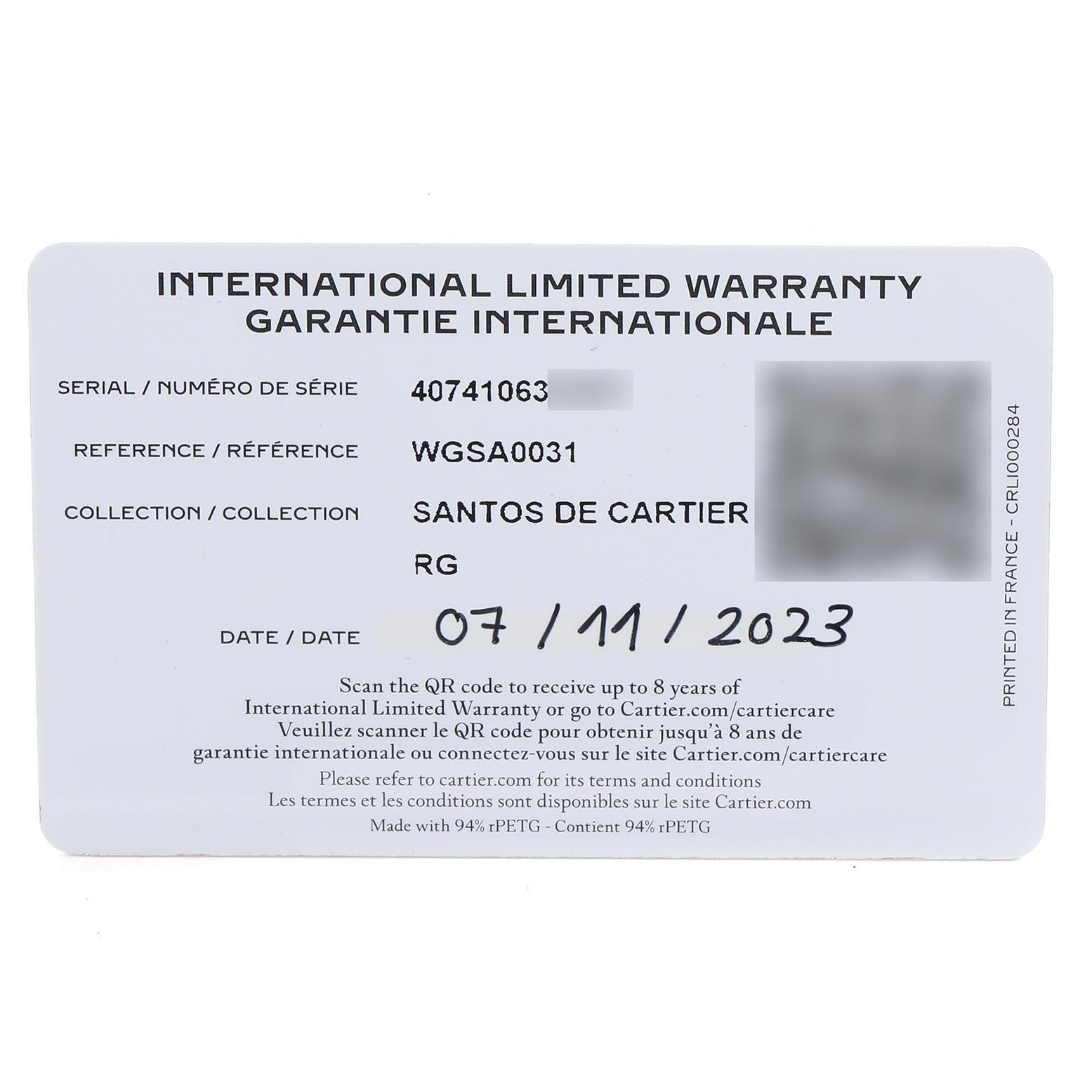 The image shows an International Limited Warranty card for the Santos de Cartier watch model.