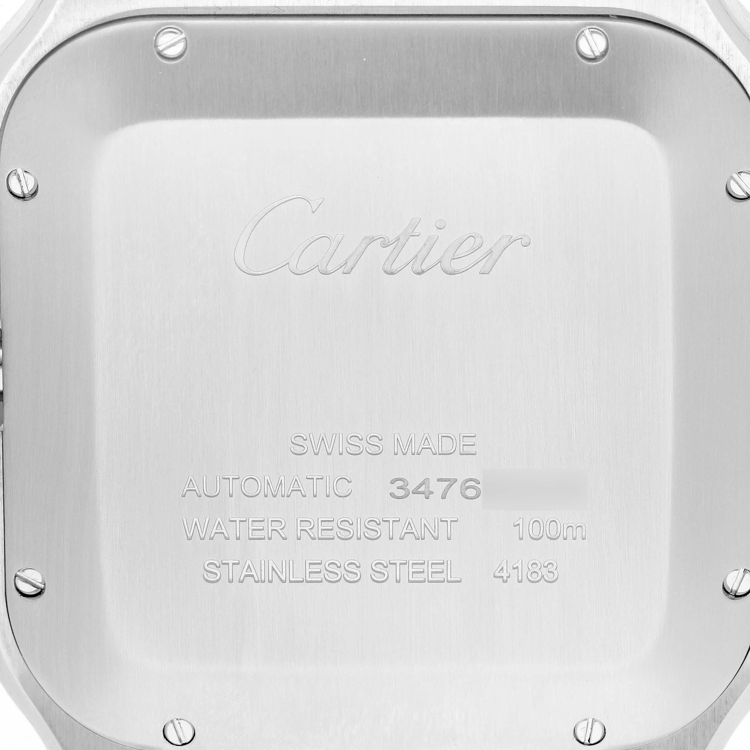 The image shows the backplate of the Cartier Santos W2SA0008 Women's Stainless Steel Silver Dial watch, highlighting the engraving and screws.