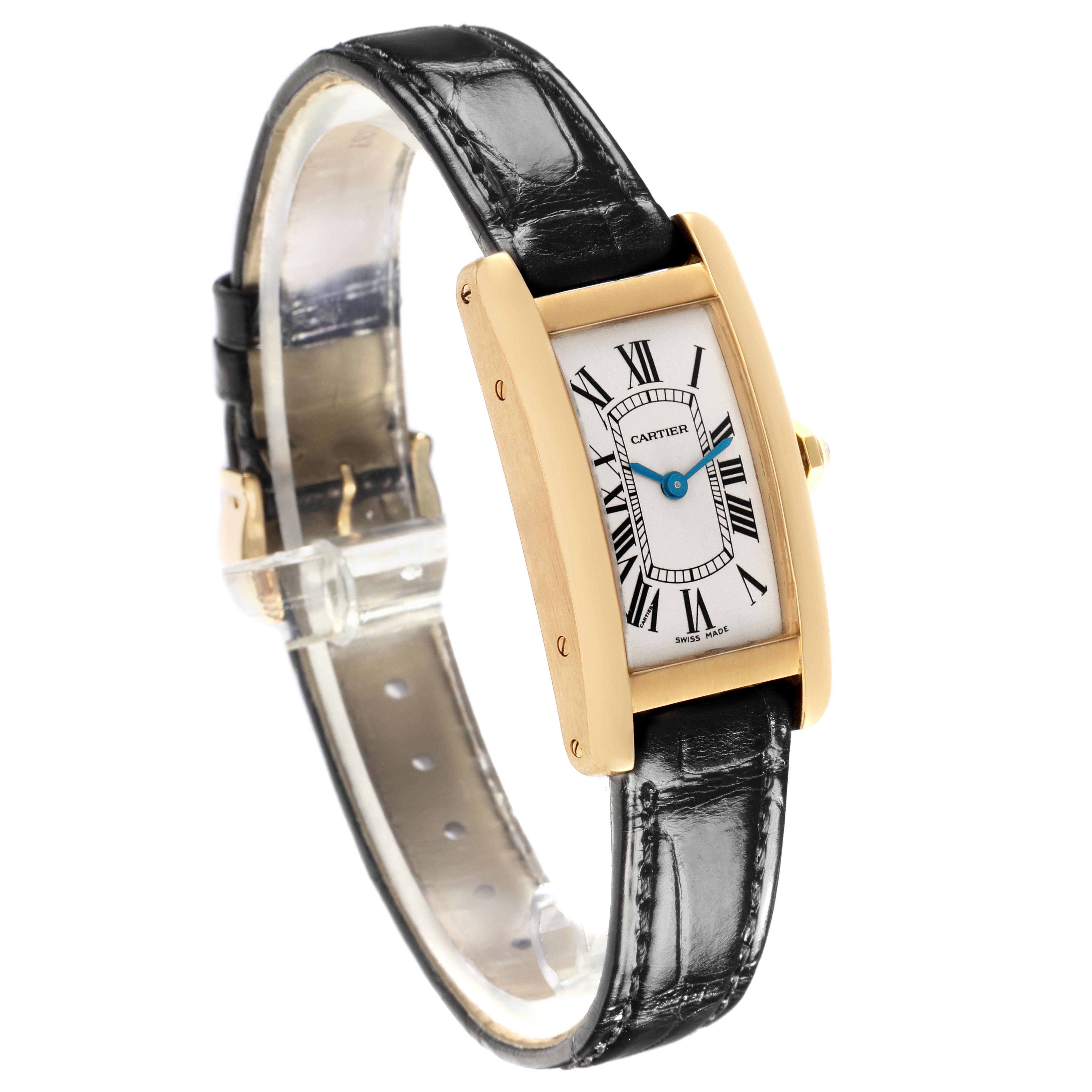 The Cartier Tank Americaine W2601556 Women's Yellow Gold Silver Dial W2601556 Women's Yellow Gold Silver Dial watch is shown from a three-quarter angle, highlighting the face, case, and strap.