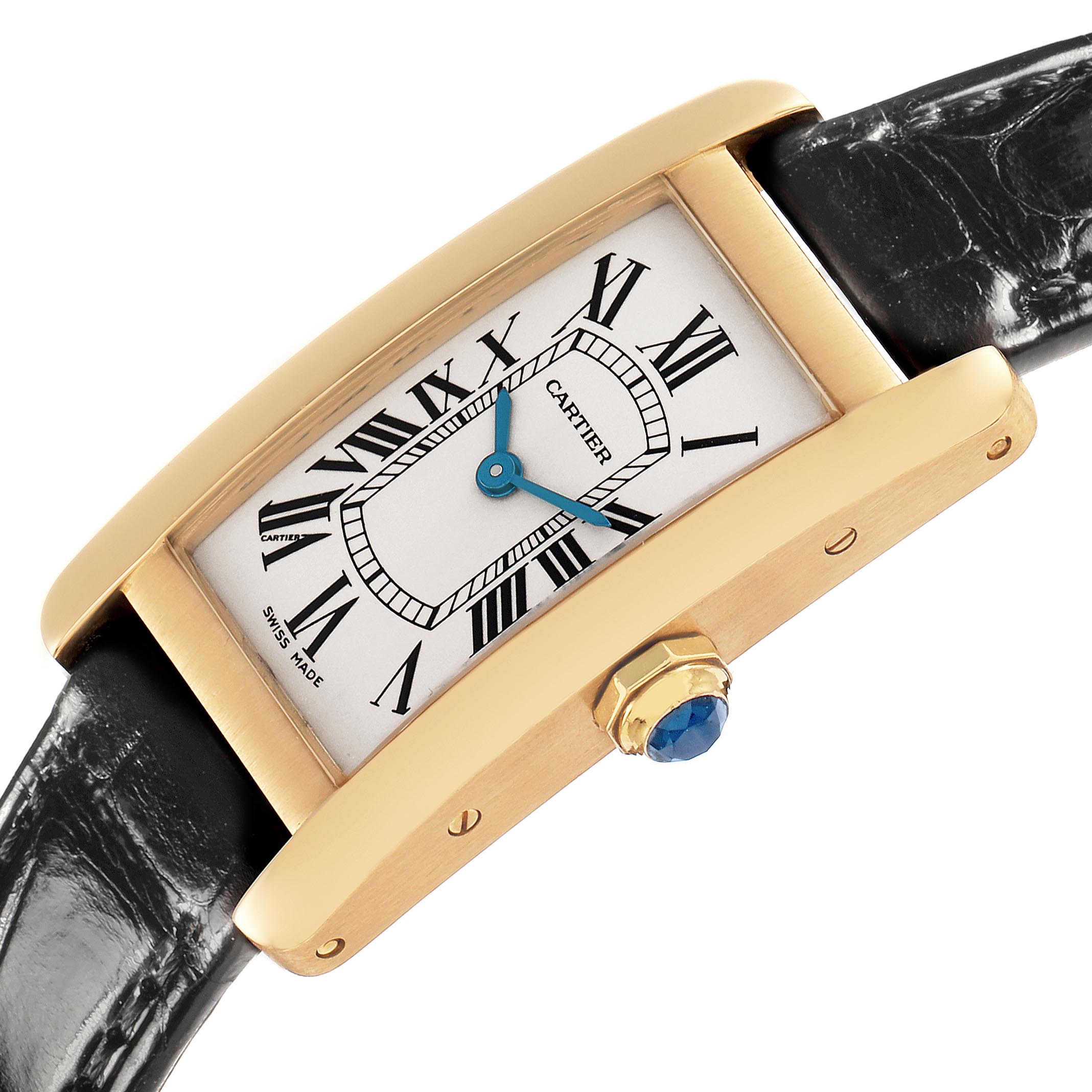 The Cartier Tank Americaine W2601556 Women's Yellow Gold Silver Dial W2601556 Women's Yellow Gold Silver Dial watch is shown at an angle highlighting the dial, case, and blue gemstone crown with a leather strap.