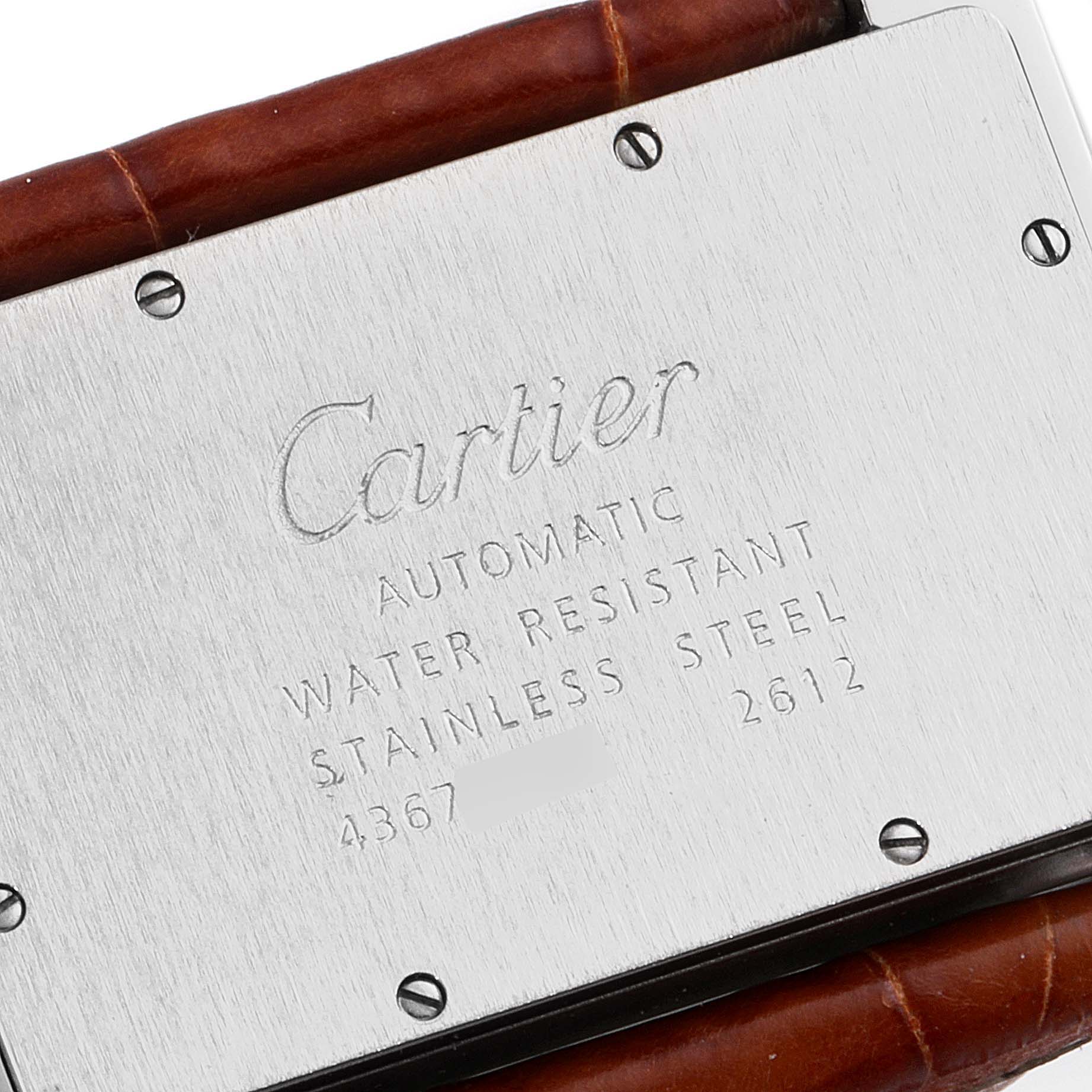 The image shows the back case of a Cartier Tank Divan W6300755 Women's Stainless Steel Silver Dial W6300755 Women's Stainless Steel Silver Dial watch, revealing the engraved brand, model information, and strap hinge.