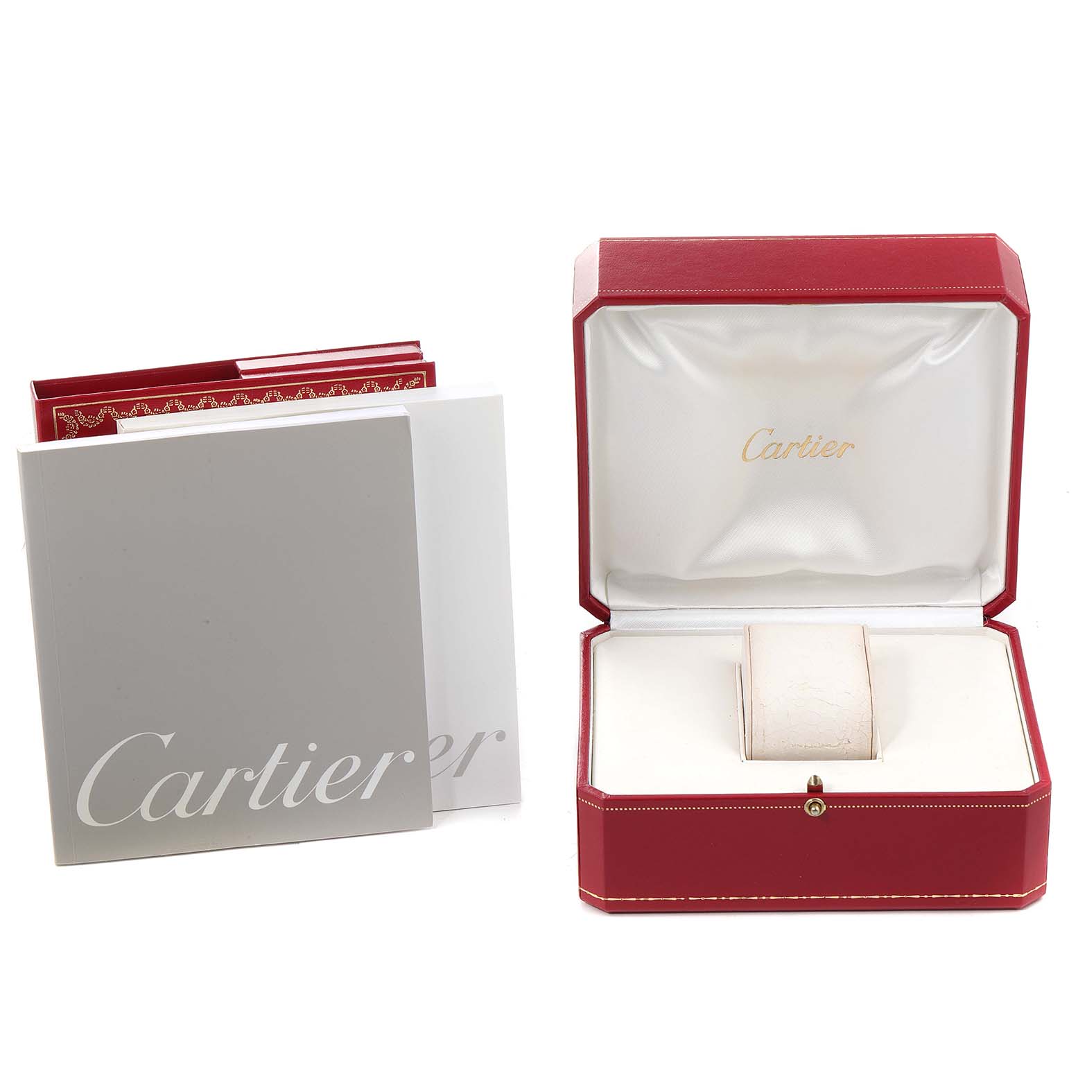 The image shows the red Cartier box and instructional booklets for the Tank Francaise model by Cartier.