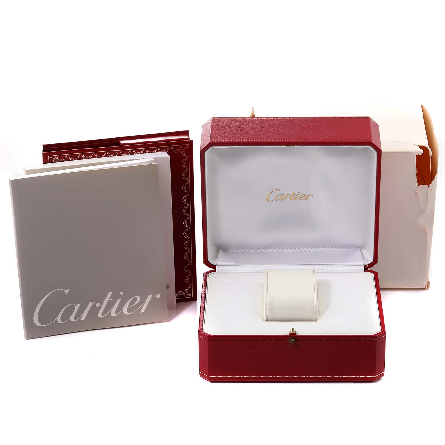 The image shows the Tank Francaise by Cartier
s open red box, outer packaging, and accompanying booklets.