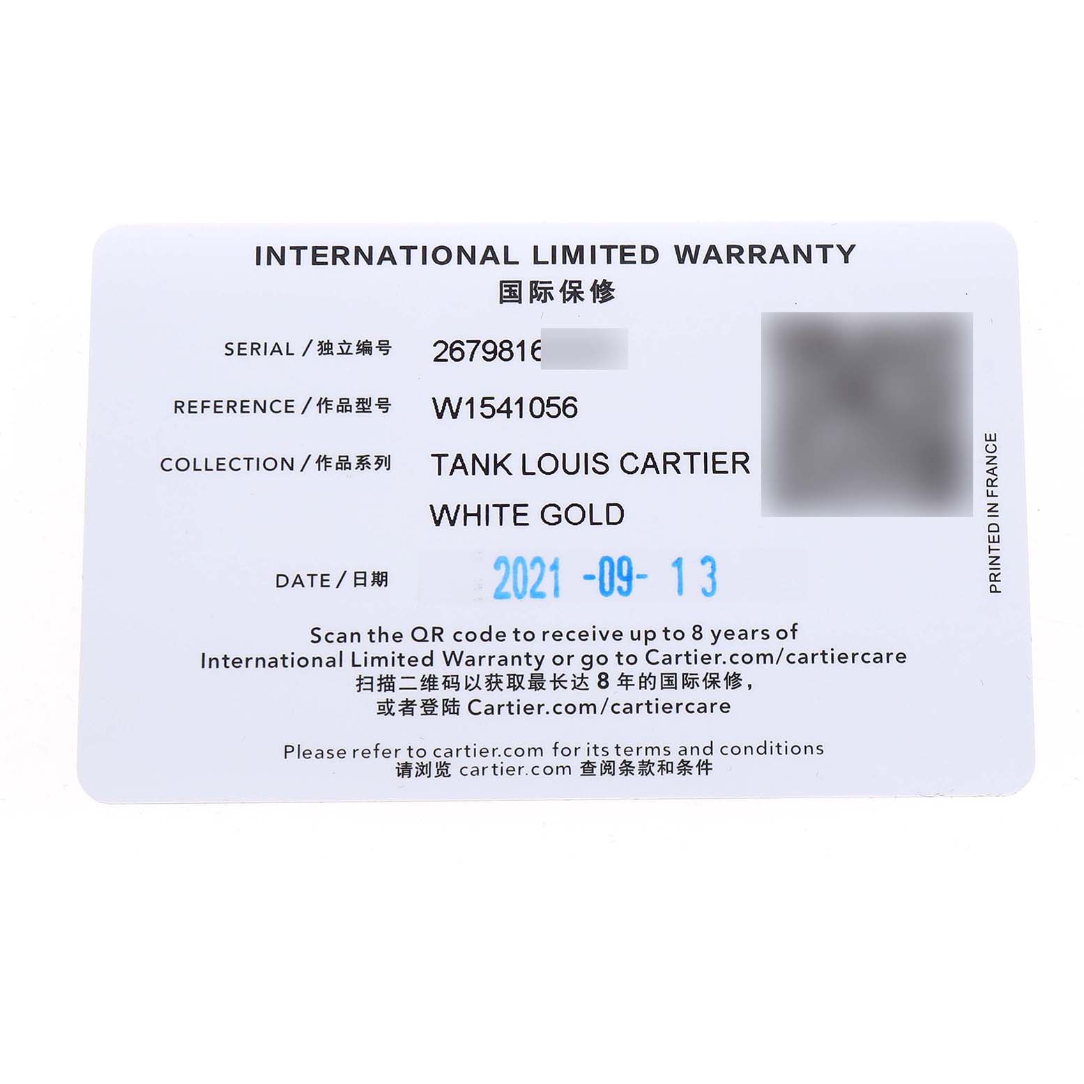 The image shows an International Limited Warranty card for a Tank Louis Cartier watch in white gold.
