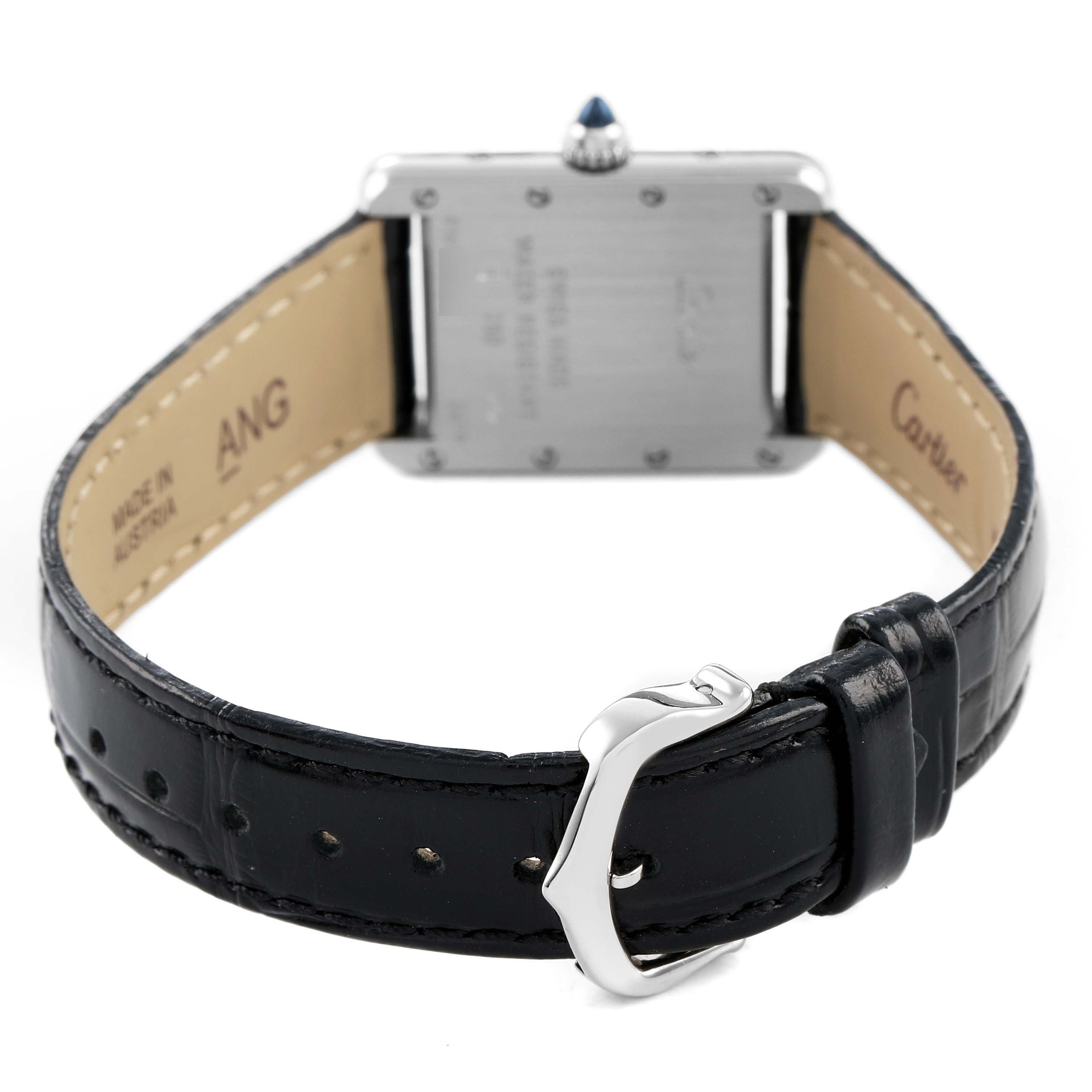 The image shows the back of a Cartier Tank Louis W1541056 Women's White Gold Silver Dial watch, highlighting the case back, buckle, and leather strap.