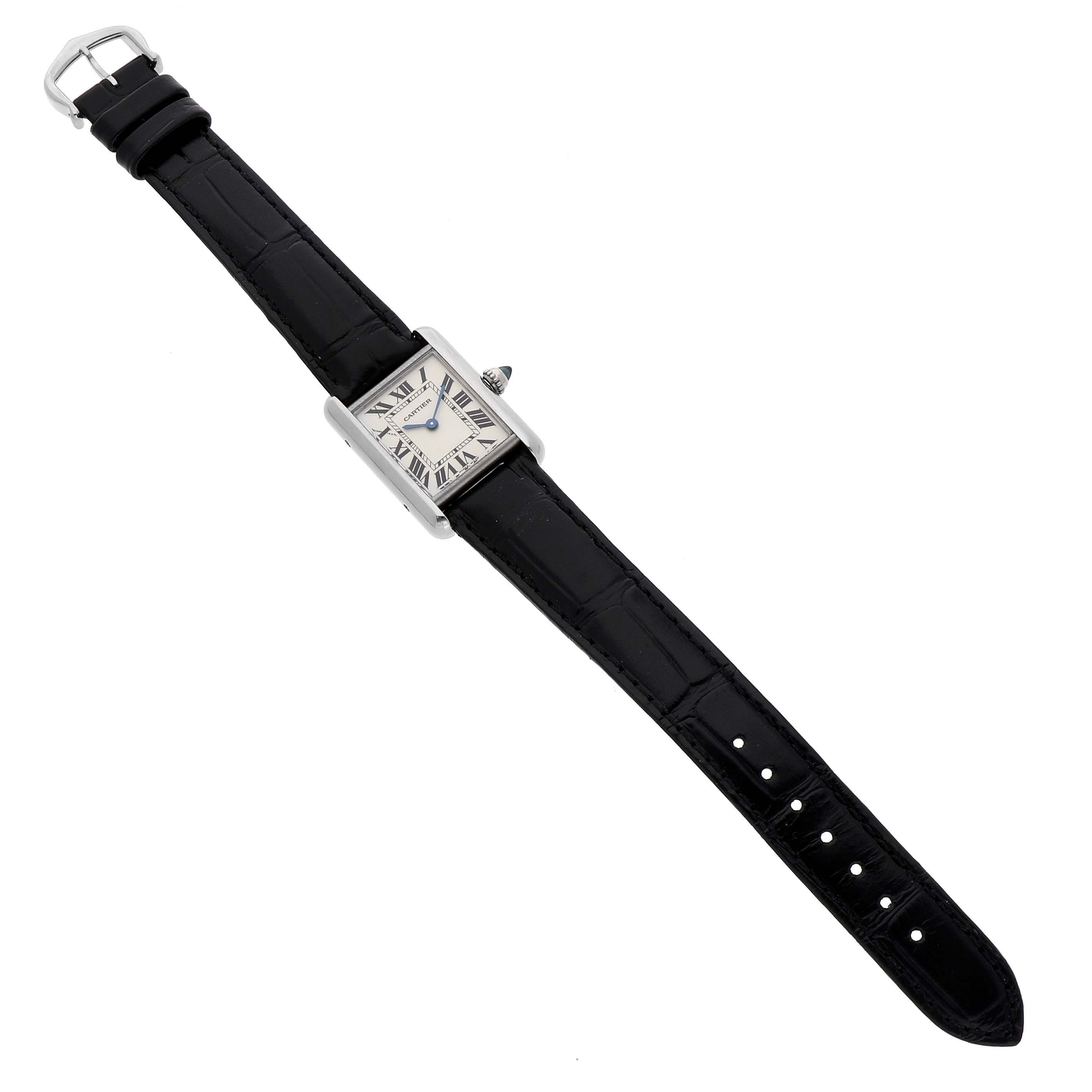 The Cartier Tank Louis W1541056 Women's White Gold Silver Dial watch is shown from a top view, displaying its rectangular face, Roman numerals, and black leather strap.