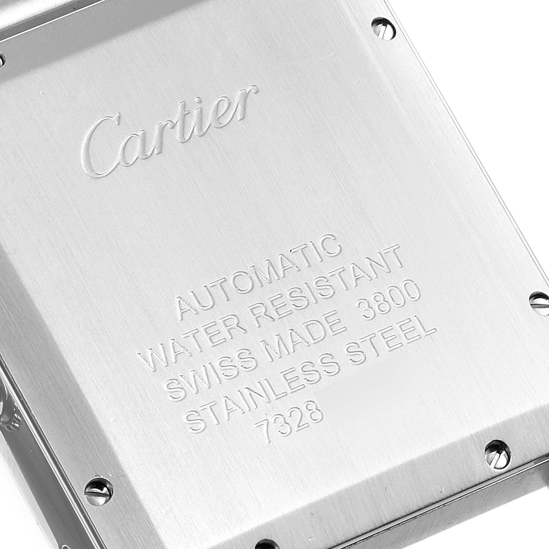 The image shows the stainless steel back case of a Cartier Tank Solo W5200028 Men's Stainless Steel Silver Dial W5200028 Men's Stainless Steel Silver Dial watch, with engraved details and brand name.