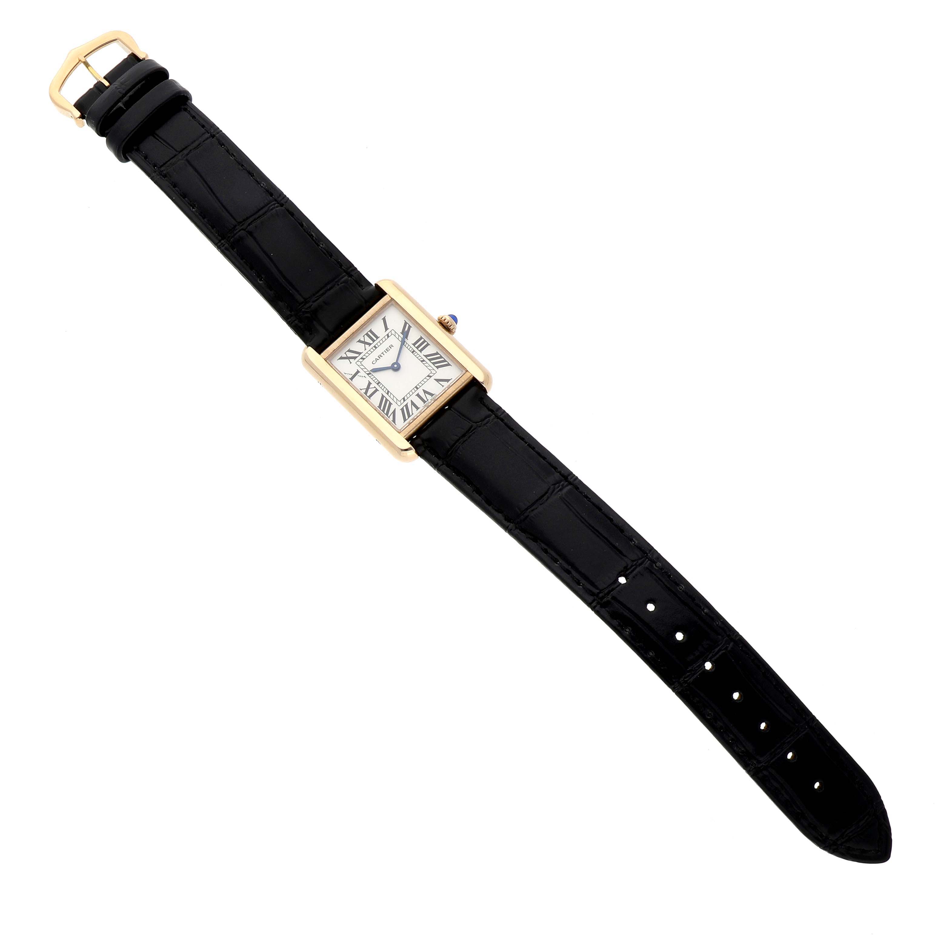 The Cartier Tank Solo W5200002 Women's Yellow Gold Silver Dial watch is shown from a top-down angle, displaying its rectangular face and black leather strap.