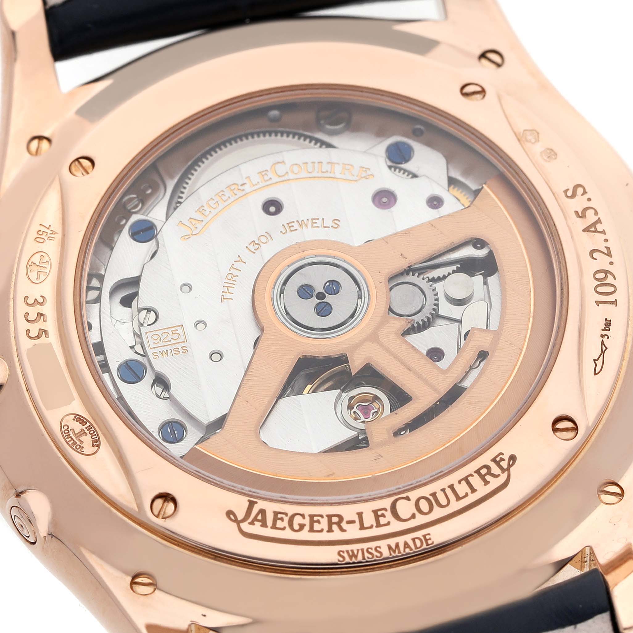 The image shows the back of the Jaeger LeCoultre Master Q1362510 Men's Rose Gold Beige Dial model, highlighting its intricate mechanical movement.
