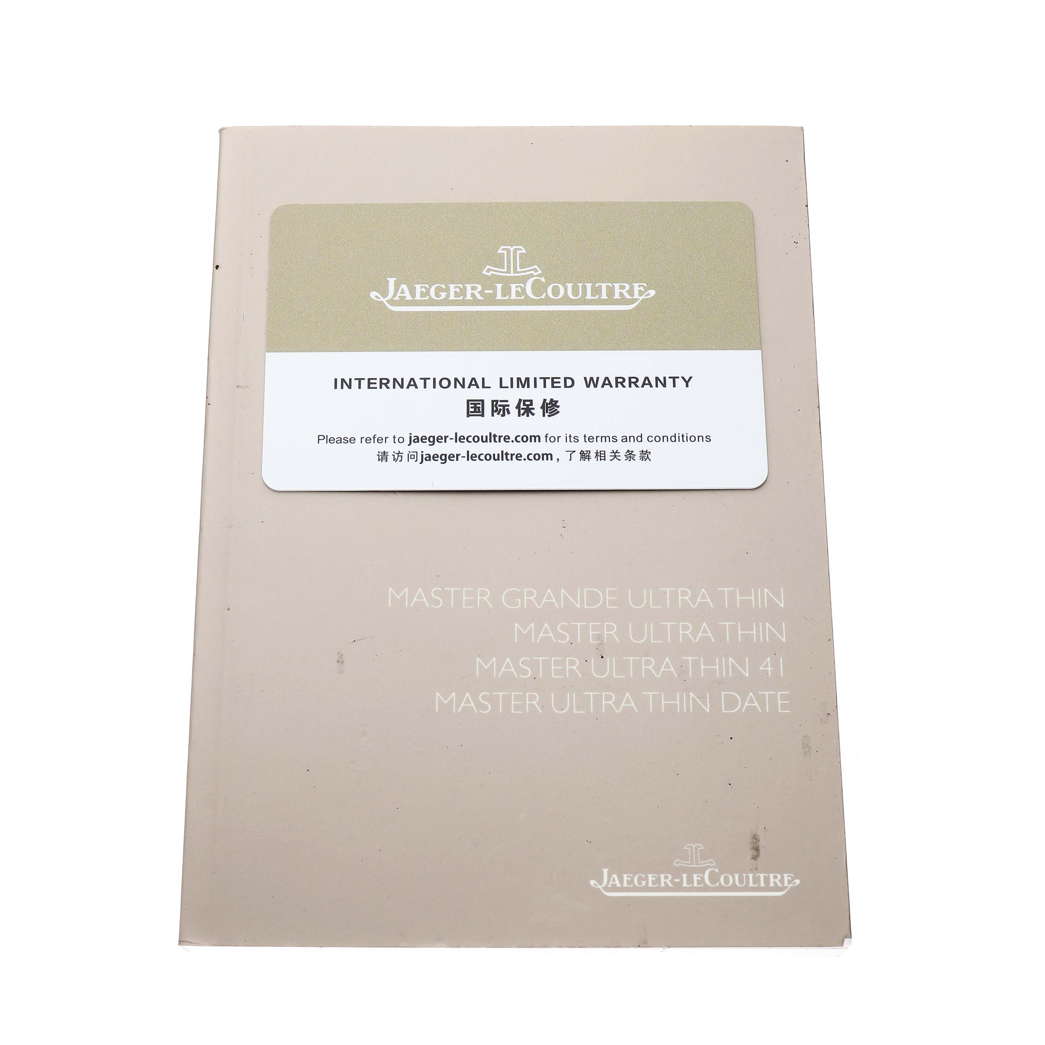 The image shows a Jaeger LeCoultre Master Q1362510 Men's Rose Gold Beige Dial model warranty card and booklet, viewed from above.