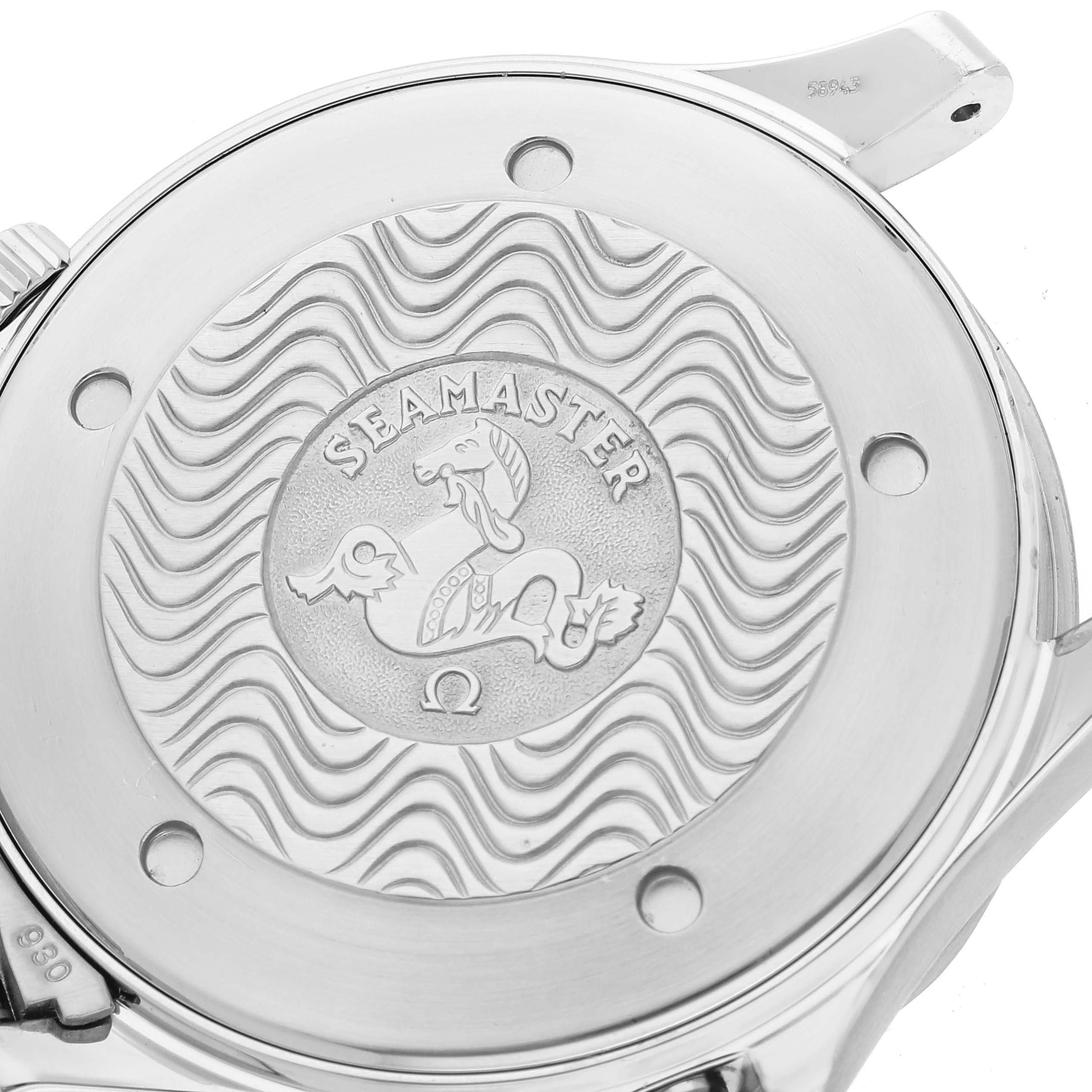 The image shows the case back of an Omega Seamaster 2265.80.00 Men
s Stainless Steel Blue Dial 2265.80.00 Men
s Stainless Steel Blue Dial watch, highlighting the engraved logo and wave pattern.