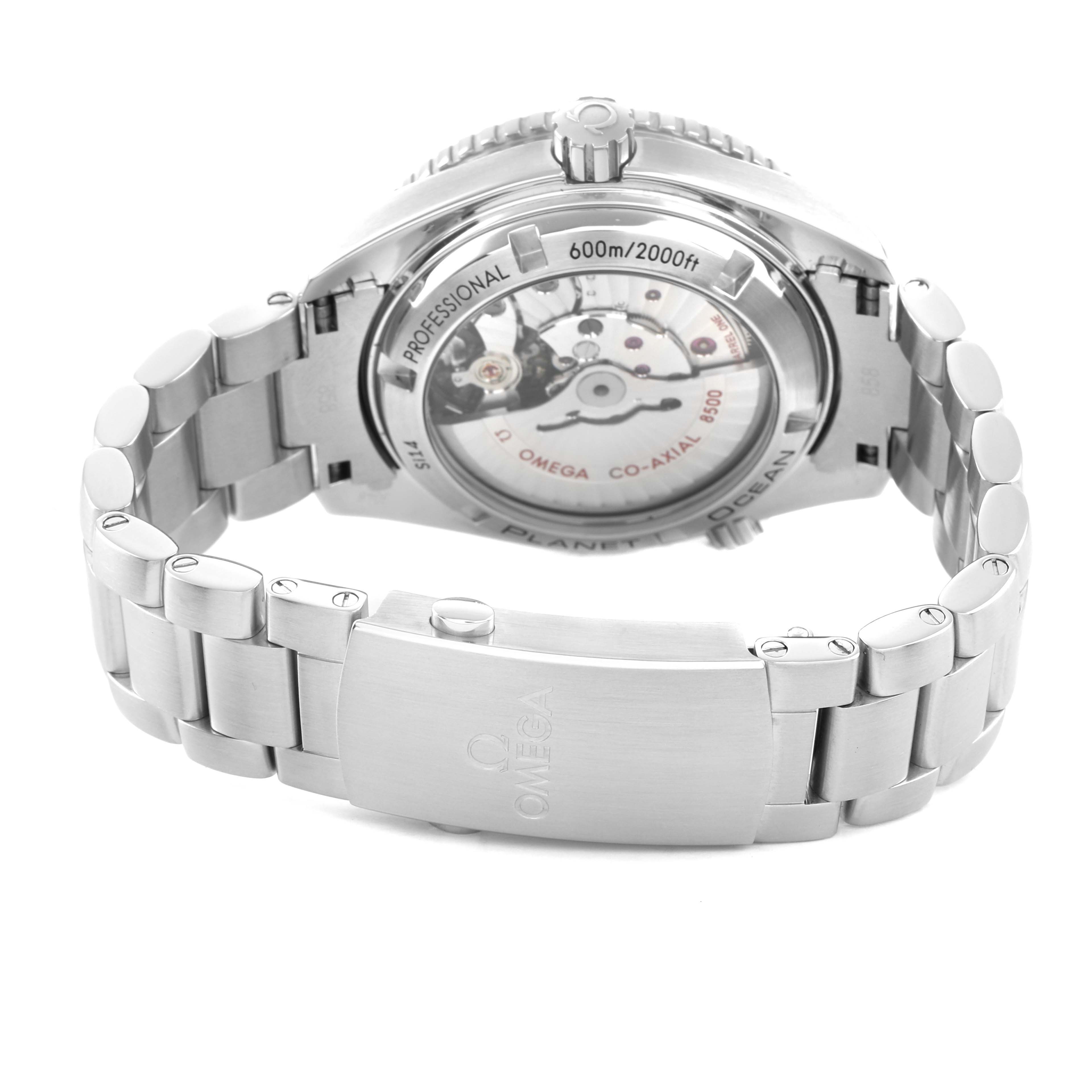 The Omega Planet Ocean 232.30.42.21.01.003 Men's Stainless Steel Black Dial watch is shown from the back, highlighting the case back and stainless steel bracelet.