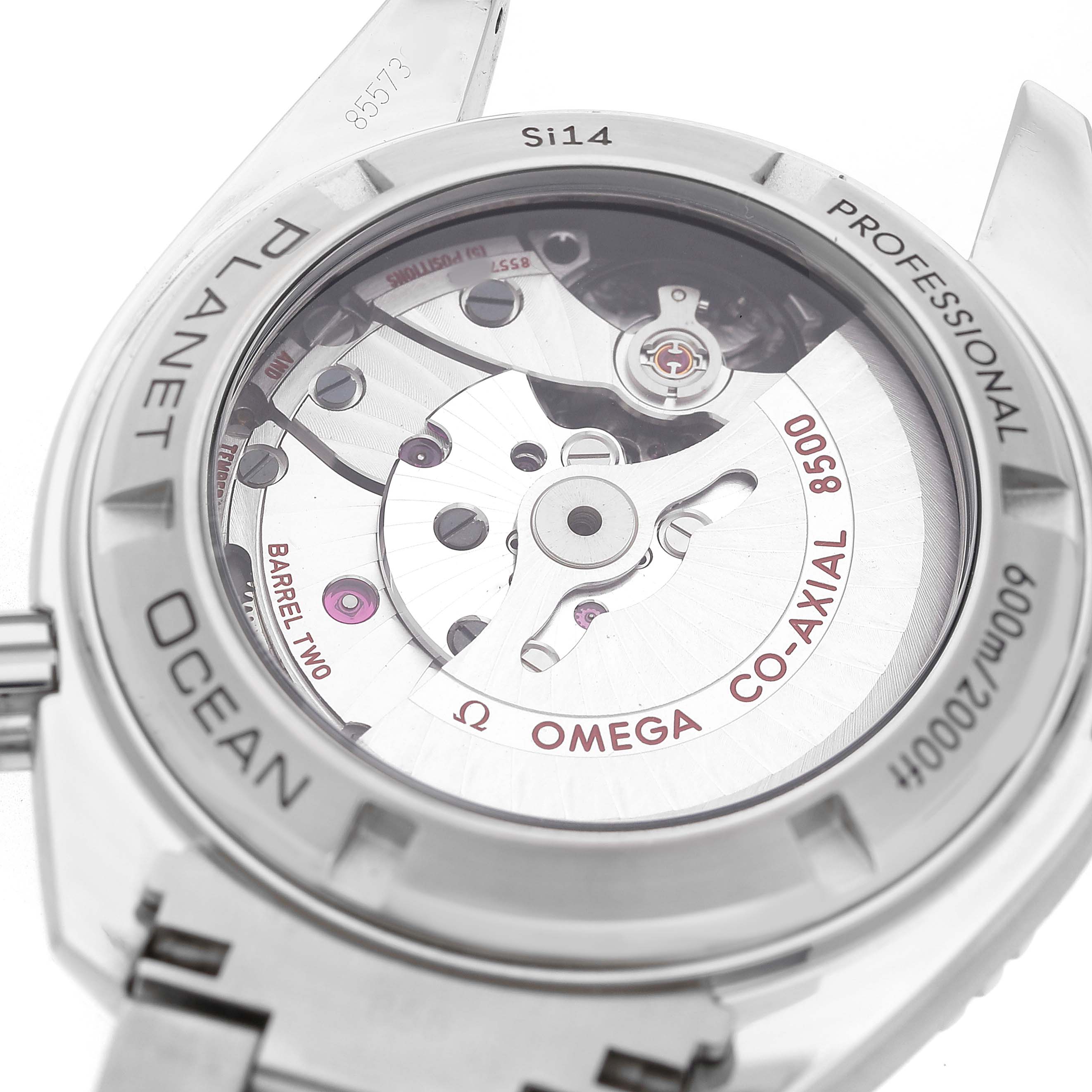 The image shows the backside of the Omega Planet Ocean 232.30.42.21.01.003 Men's Stainless Steel Black Dial, revealing the mechanical movement and detailing.