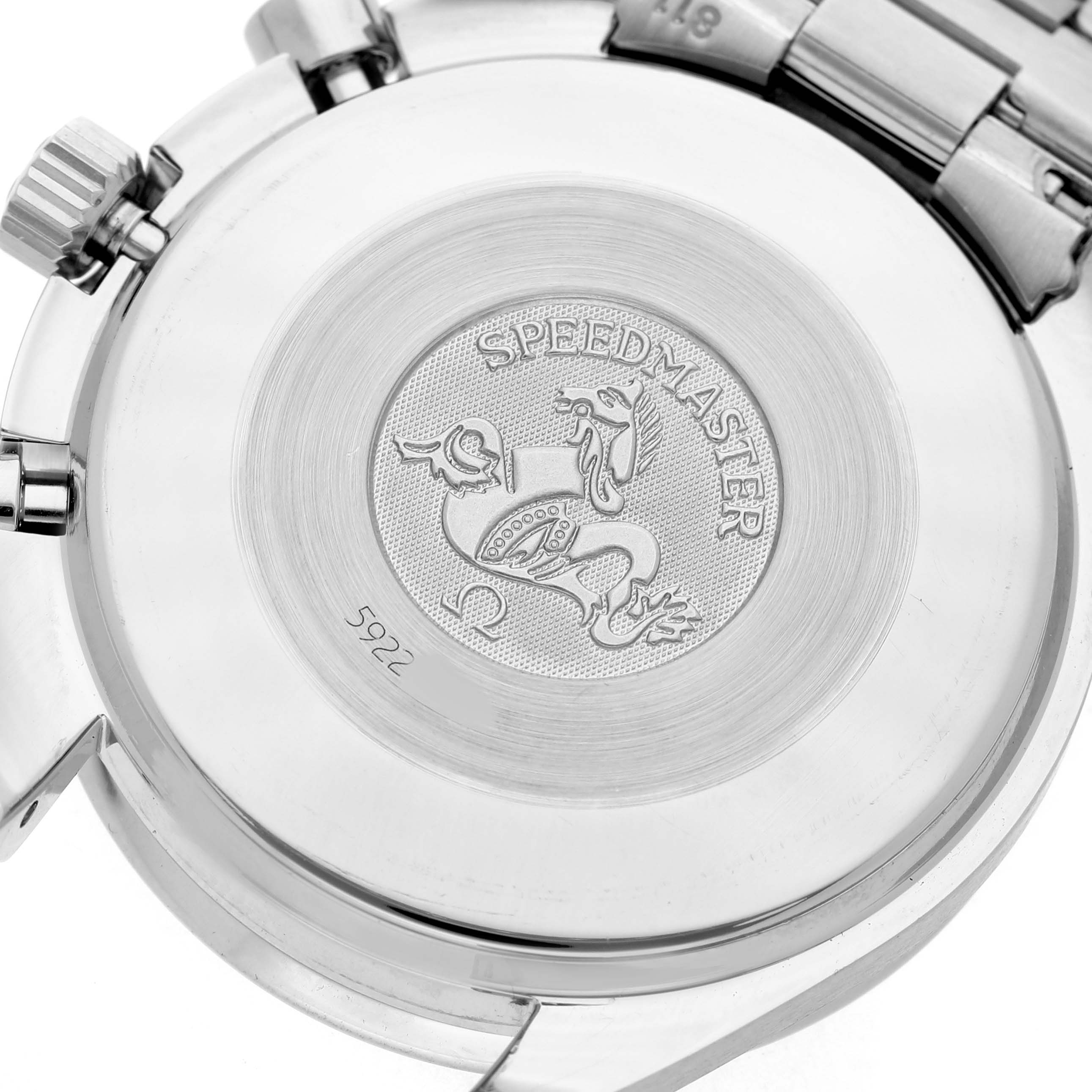 The image shows the case back of an Omega Speedmaster 3510.50.00 Men's Stainless Steel Black Dial, featuring its engraving and part of the bracelet attachment.