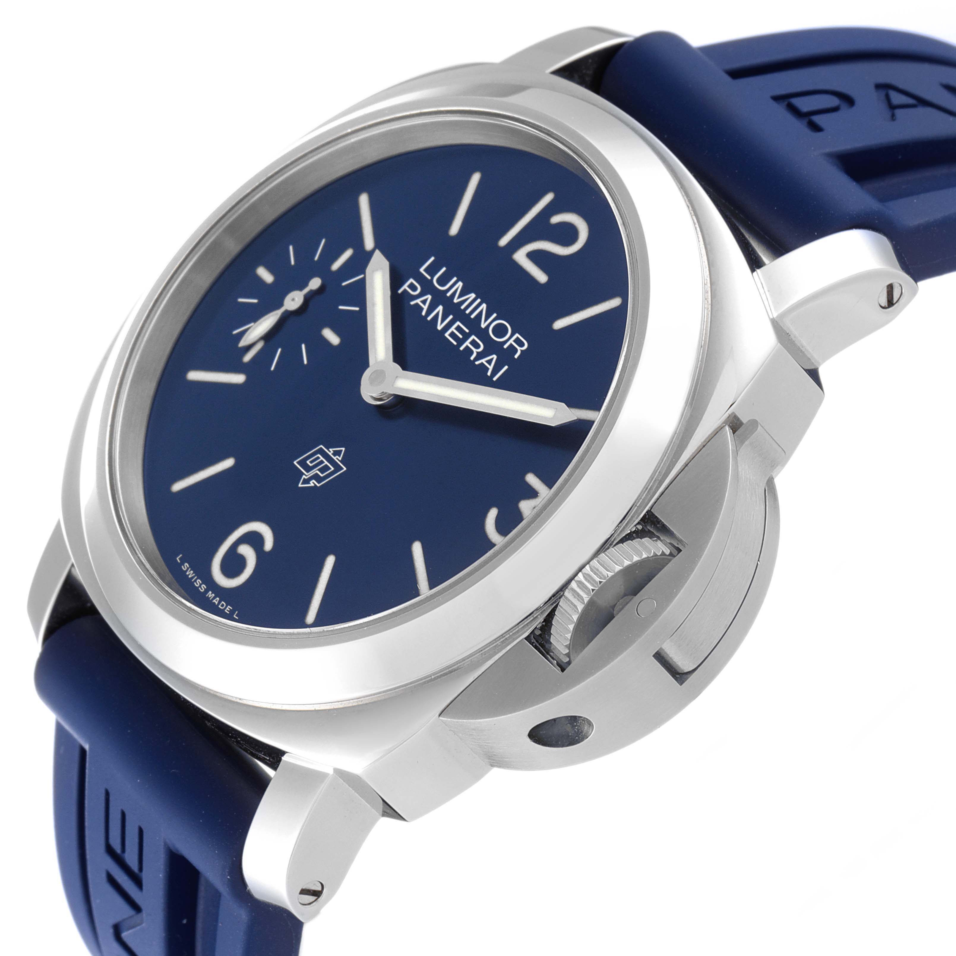 This is a side angle view of a Panerai Luminor PAM00631 Men's Stainless Steel Blue Dial PAM00631 Men's Stainless Steel Blue Dial watch, showing its blue dial, silver casing, and blue rubber strap.
