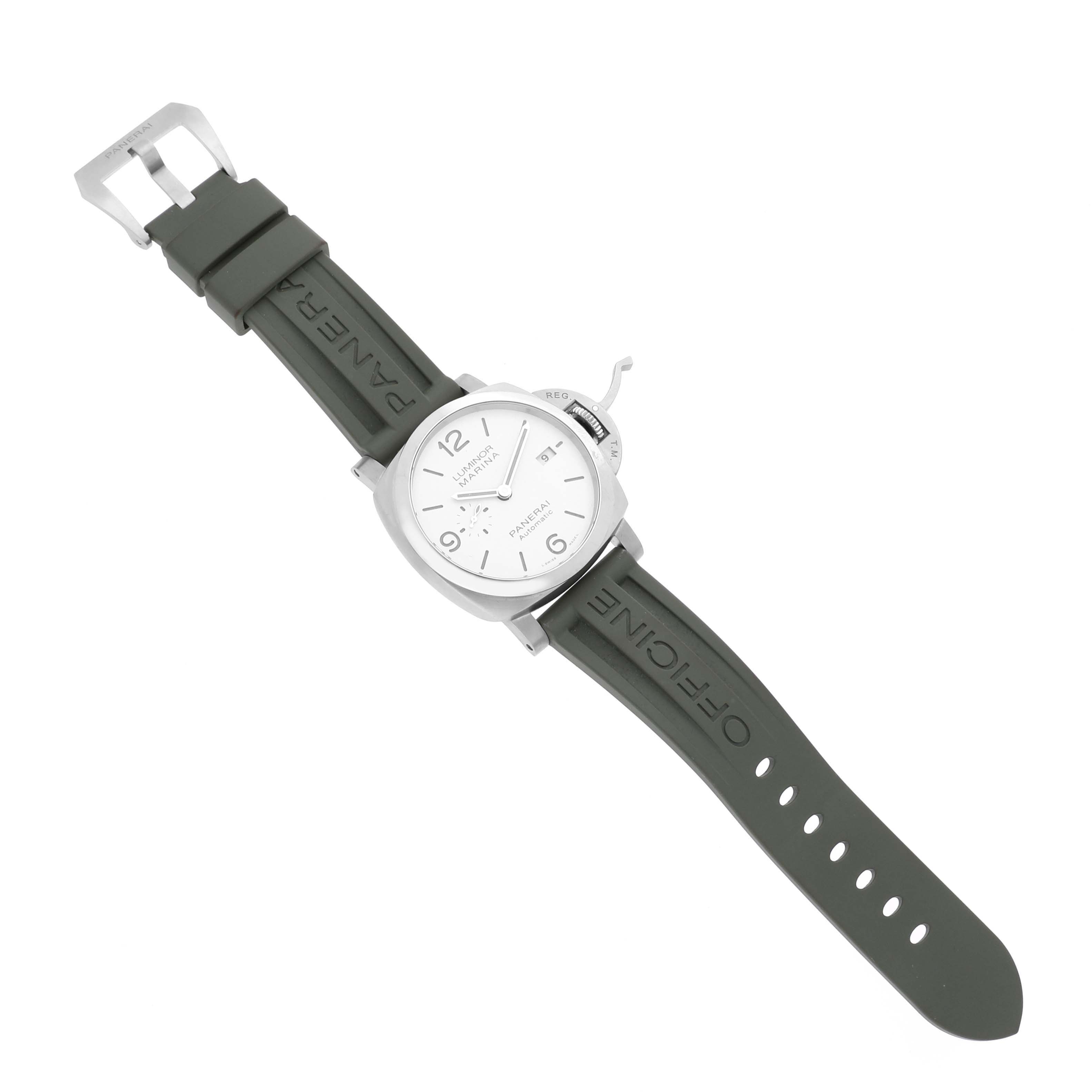 The Panerai Luminor PAM01314 Men's Stainless Steel White Dial PAM01314 Men's Stainless Steel White Dial watch is shown from a top-down angle, highlighting the white dial, olive green strap, and distinctive crown guard.