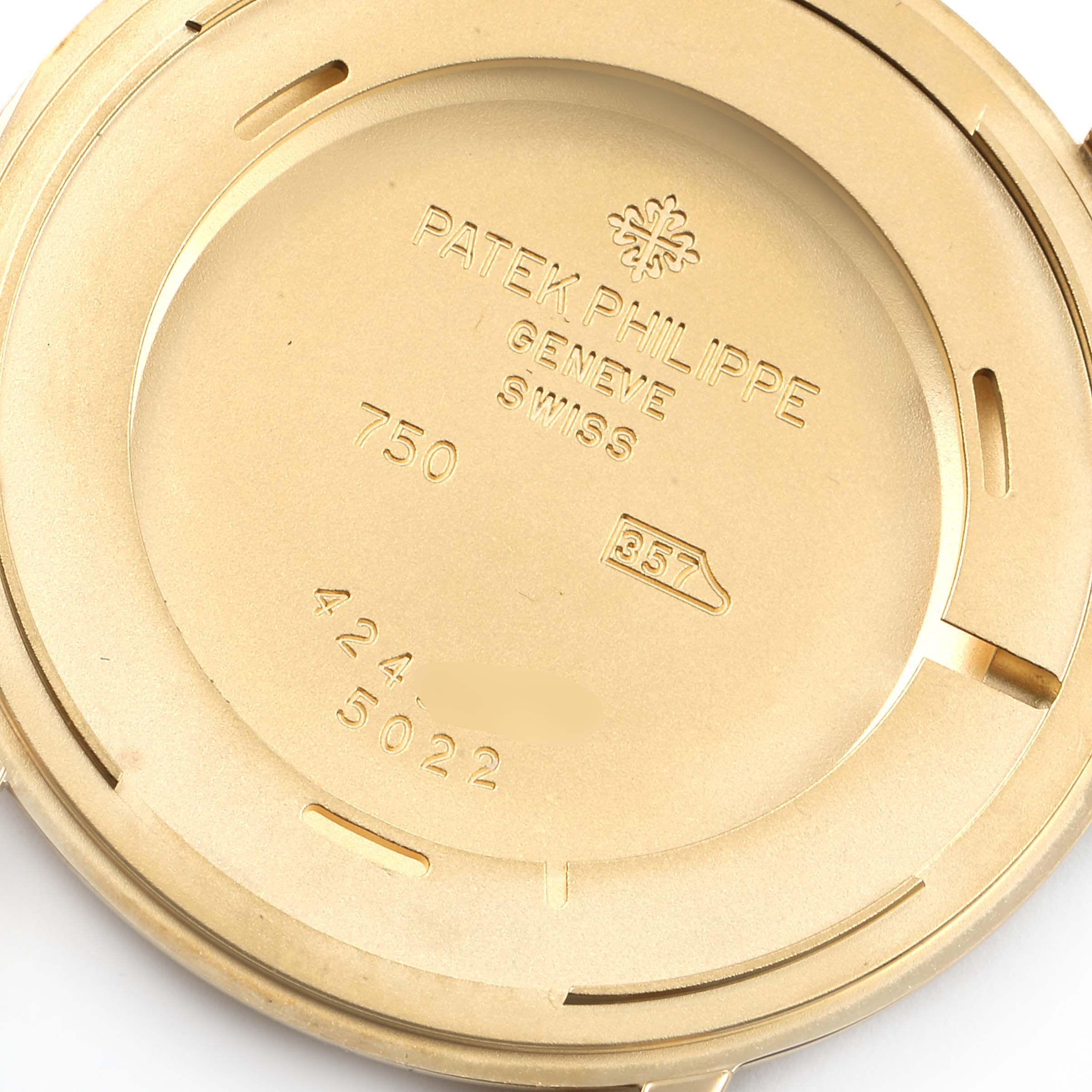 This image shows the back case of a Patek Philippe Calatrava 5022R Men's Rose Gold Pink Dial 5022R Men's Rose Gold Pink Dial 5022 watch, featuring engraved markings and details.