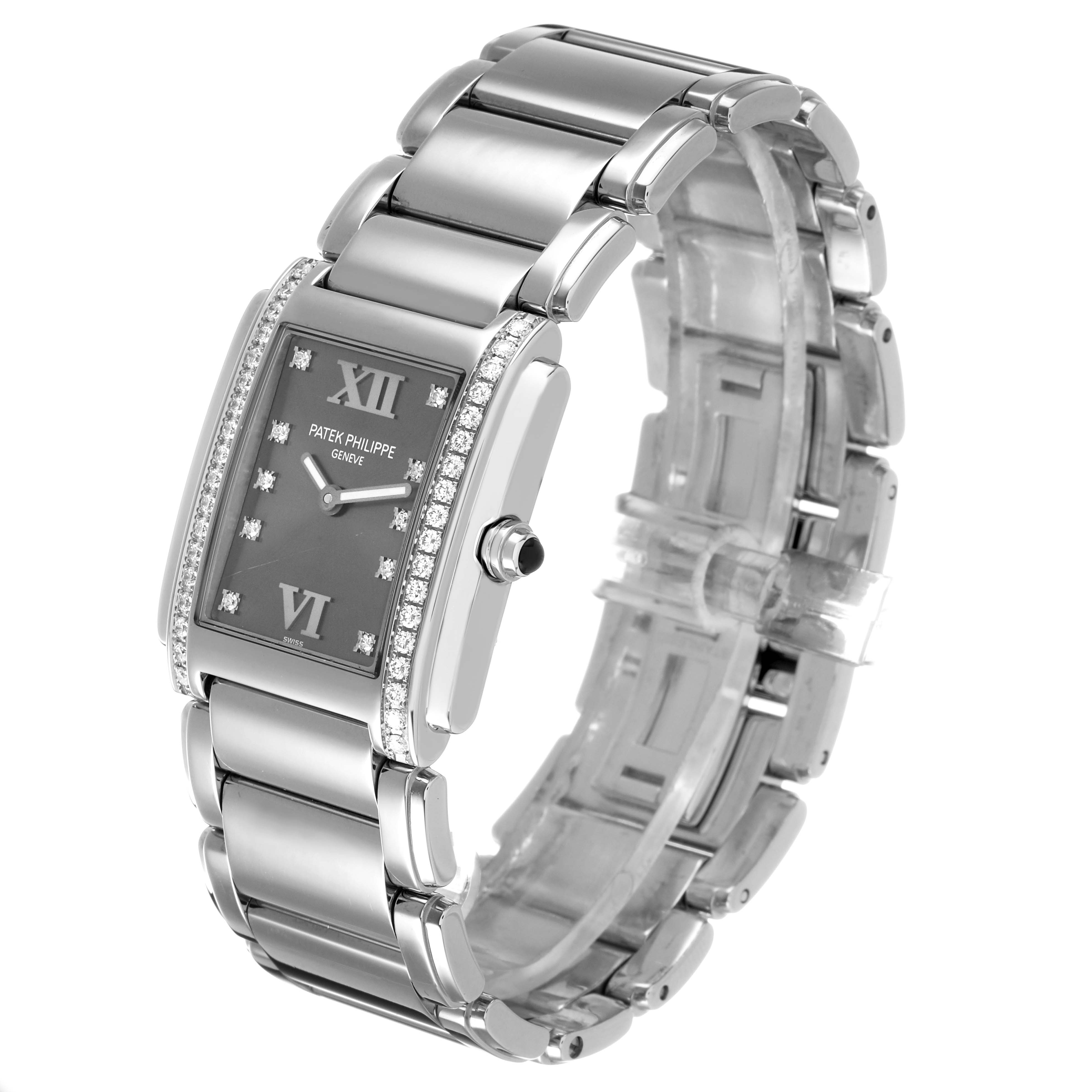 The Patek Philippe Twenty-4 4910/10A-010 Women's Stainless Steel Grey Dial watch is shown at a three-quarter angle, highlighting the face, bracelet, and side details.
