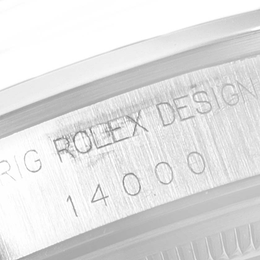 This image shows a close-up of the case and bezel of a Rolex Air-King 14000 Men's Stainless Steel Blue Dial 14000 Men's Stainless Steel Blue Dial, highlighting the engraved model number "14000."