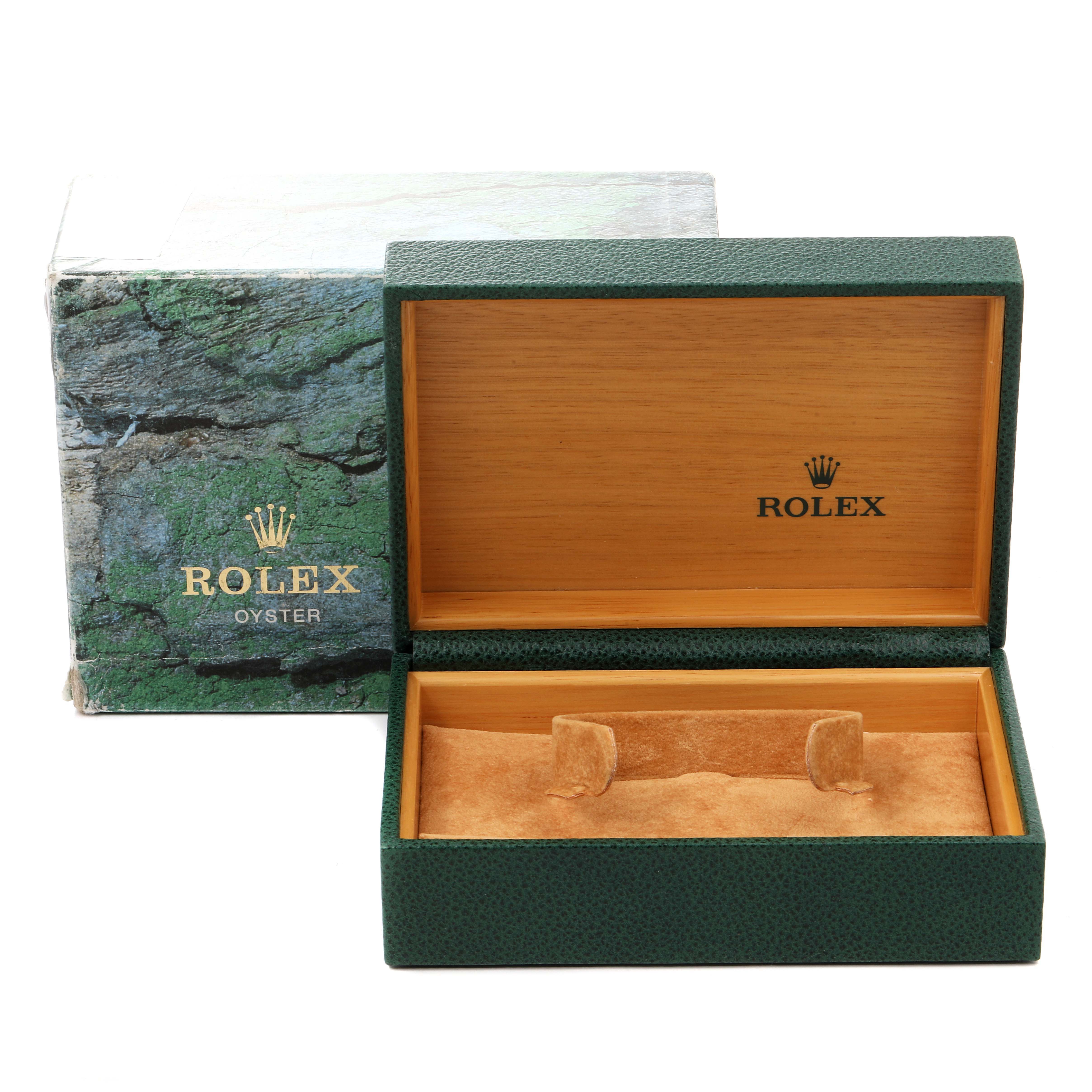 The image shows an open green and wooden Rolex watch box for the Air-King model, with the outer packaging beside it.