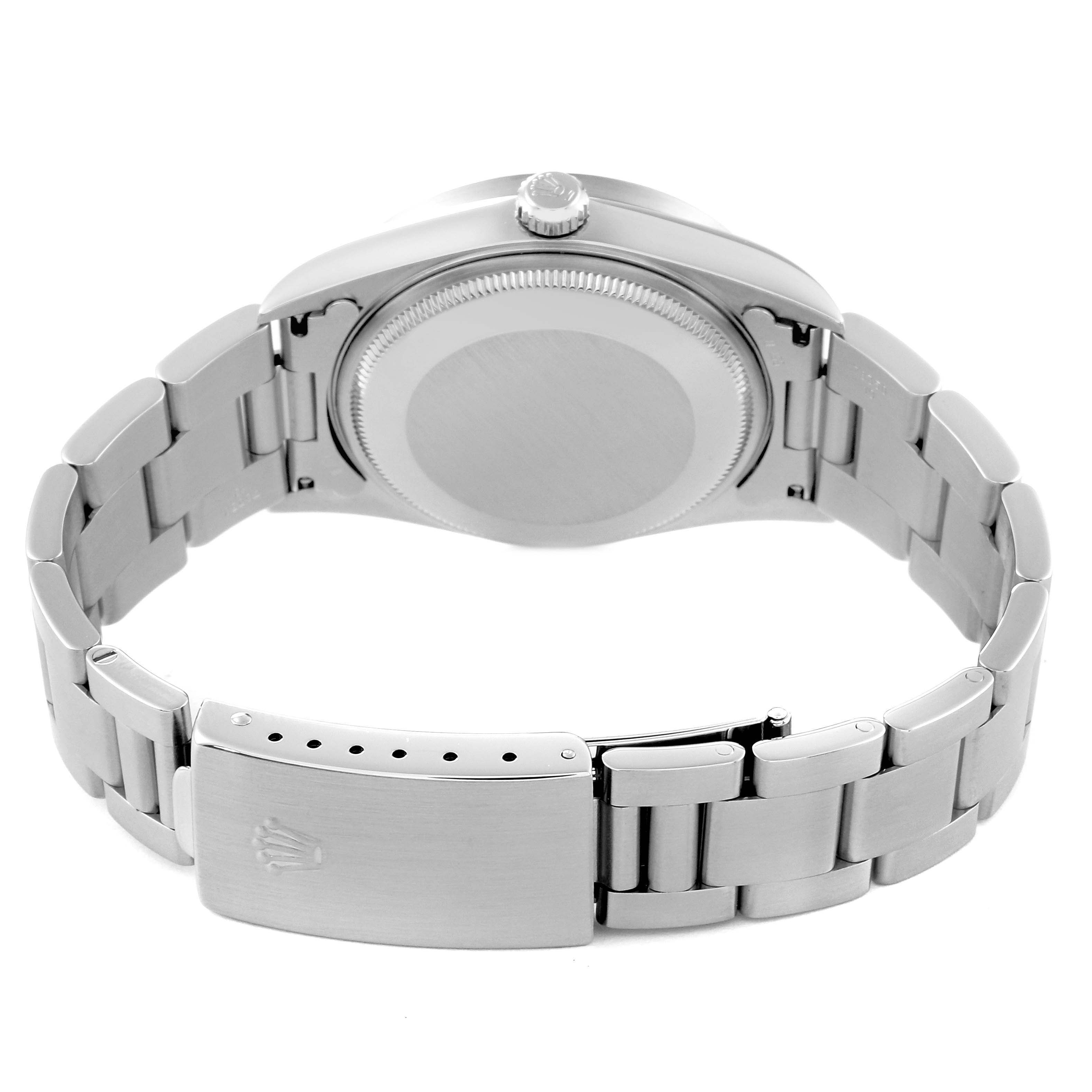 The image shows the back side of a Rolex Air-King 14010 Men's Stainless Steel White Dial 14010 Men's Stainless Steel White Dial watch, focusing on the case back and stainless steel bracelet.