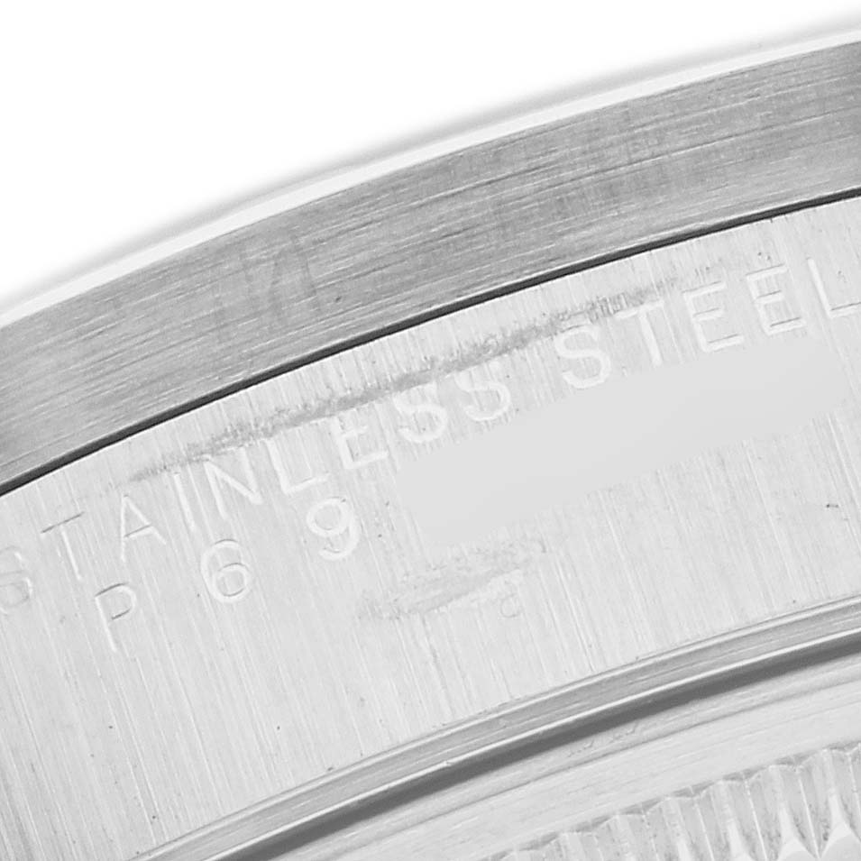 This image shows a close-up of the stainless steel case-back edge of a Rolex Air-King 14010 Men's Stainless Steel White Dial 14010 Men's Stainless Steel White Dial watch.