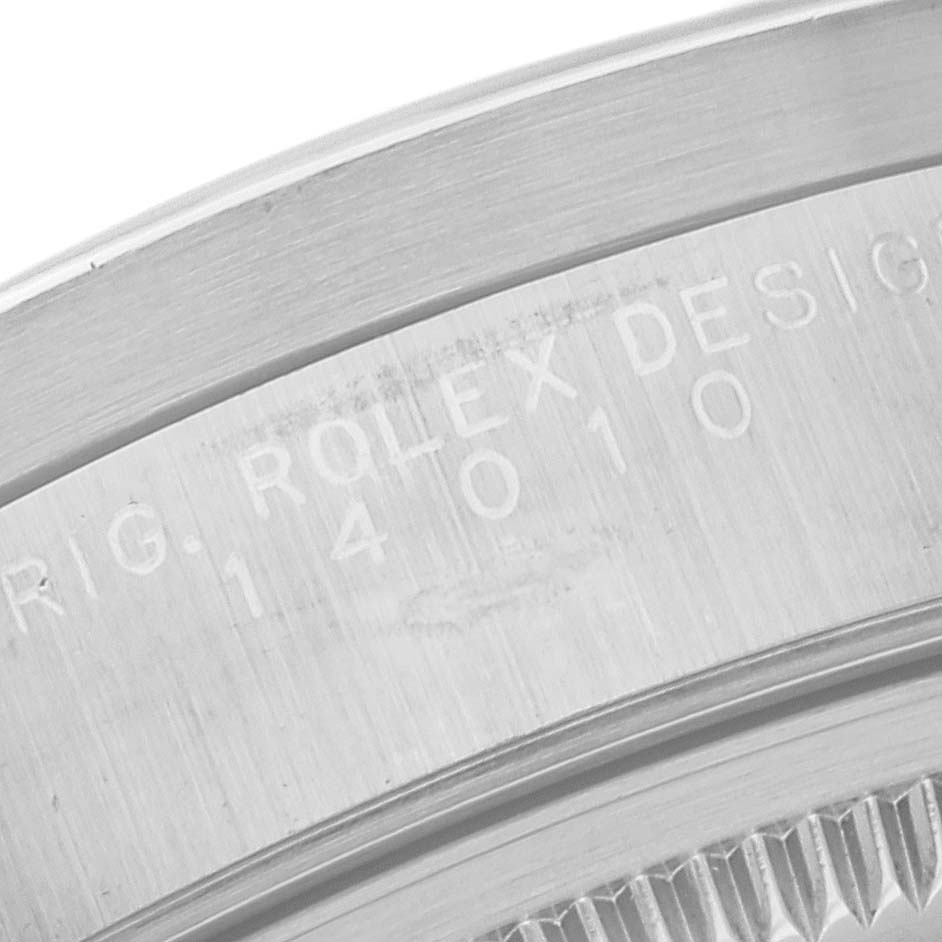 The image shows a close-up of the Rolex Air-King 14010 Men's Stainless Steel White Dial 14010 Men's Stainless Steel White Dial model's case back, highlighting the engraved model number.