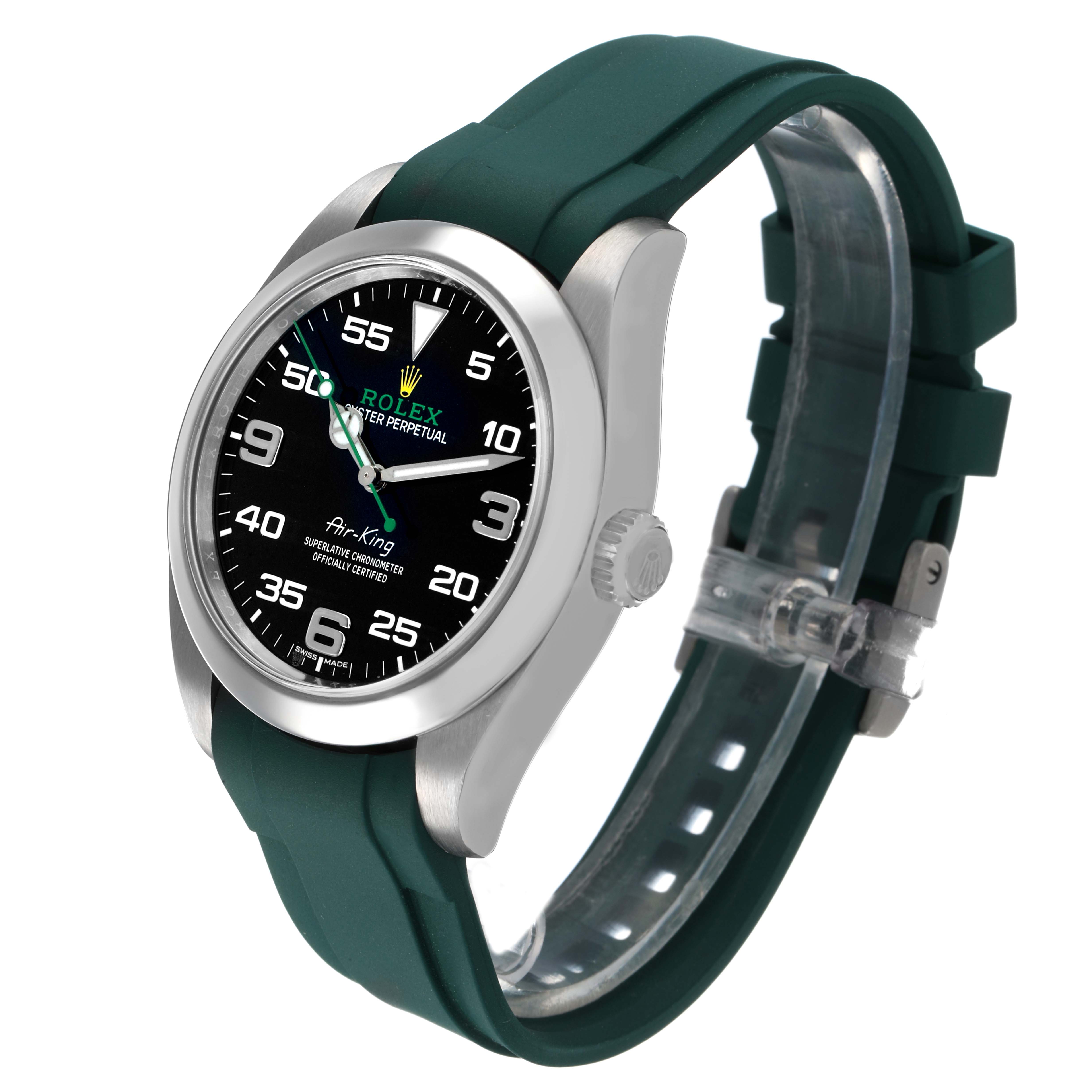 The Rolex Air-King 116900 Men's Stainless Steel Black Dial watch is shown at a slight side angle, featuring its face, bezel, crown, and green strap.