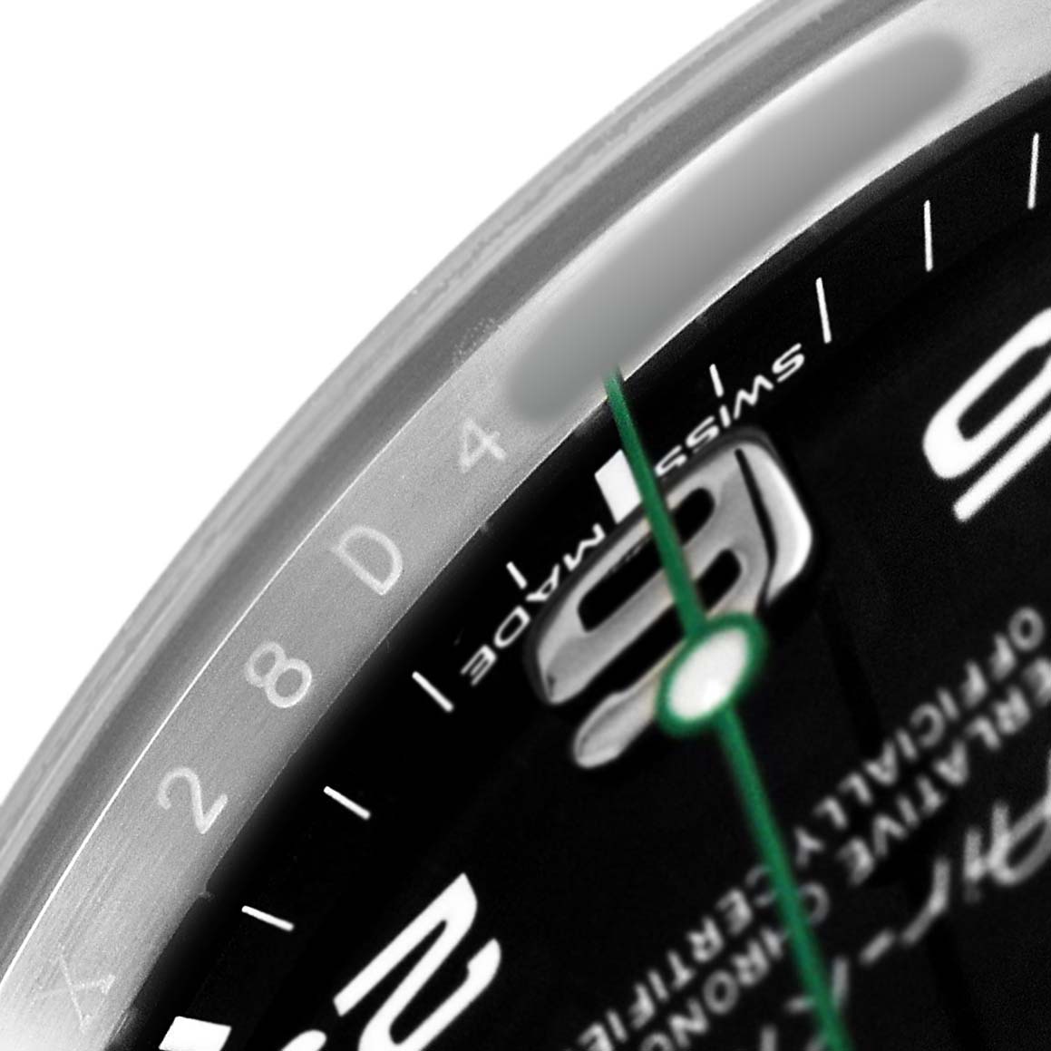 The image shows a close-up of the dial and edge of the bezel of a Rolex Air-King 116900 Men's Stainless Steel Black Dial watch.