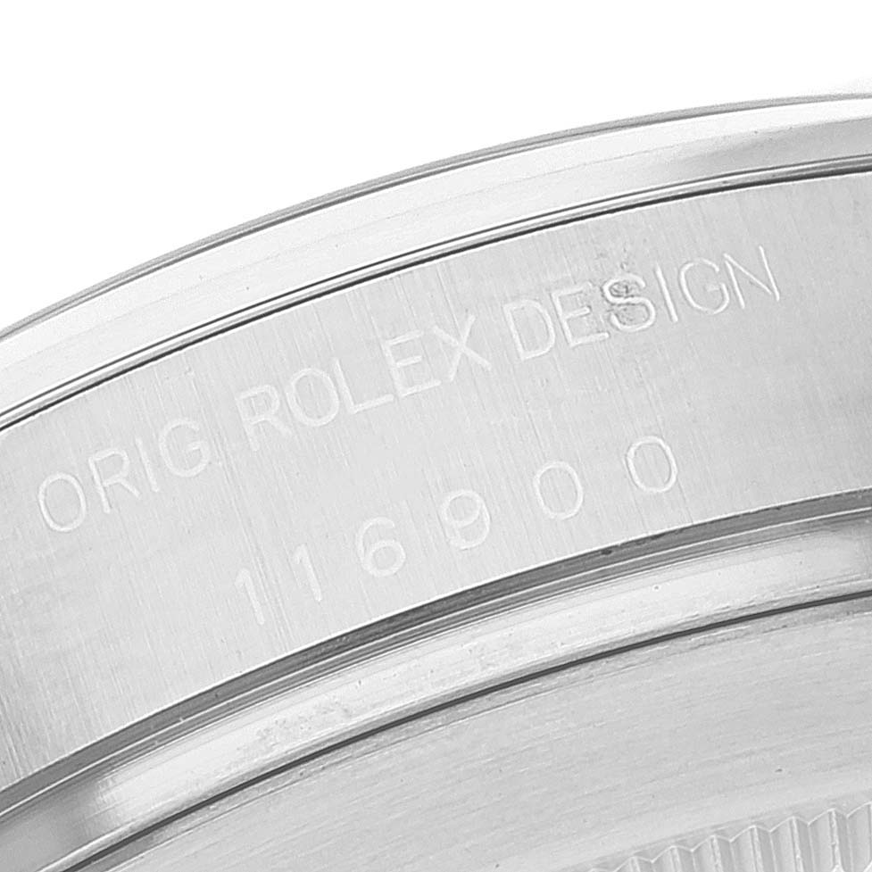 The image shows the engraved bezel and edge of the case back for a Rolex Air-King 116900 Men's Stainless Steel Black Dial watch.