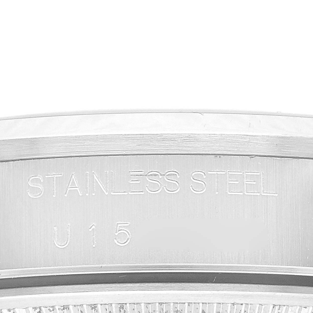 This image shows a close-up of the stainless steel case back of a Rolex Air-King 14000 Men's Stainless Steel Silver Dial 14000 Men's Stainless Steel Silver Dial watch, highlighting the engraved text.