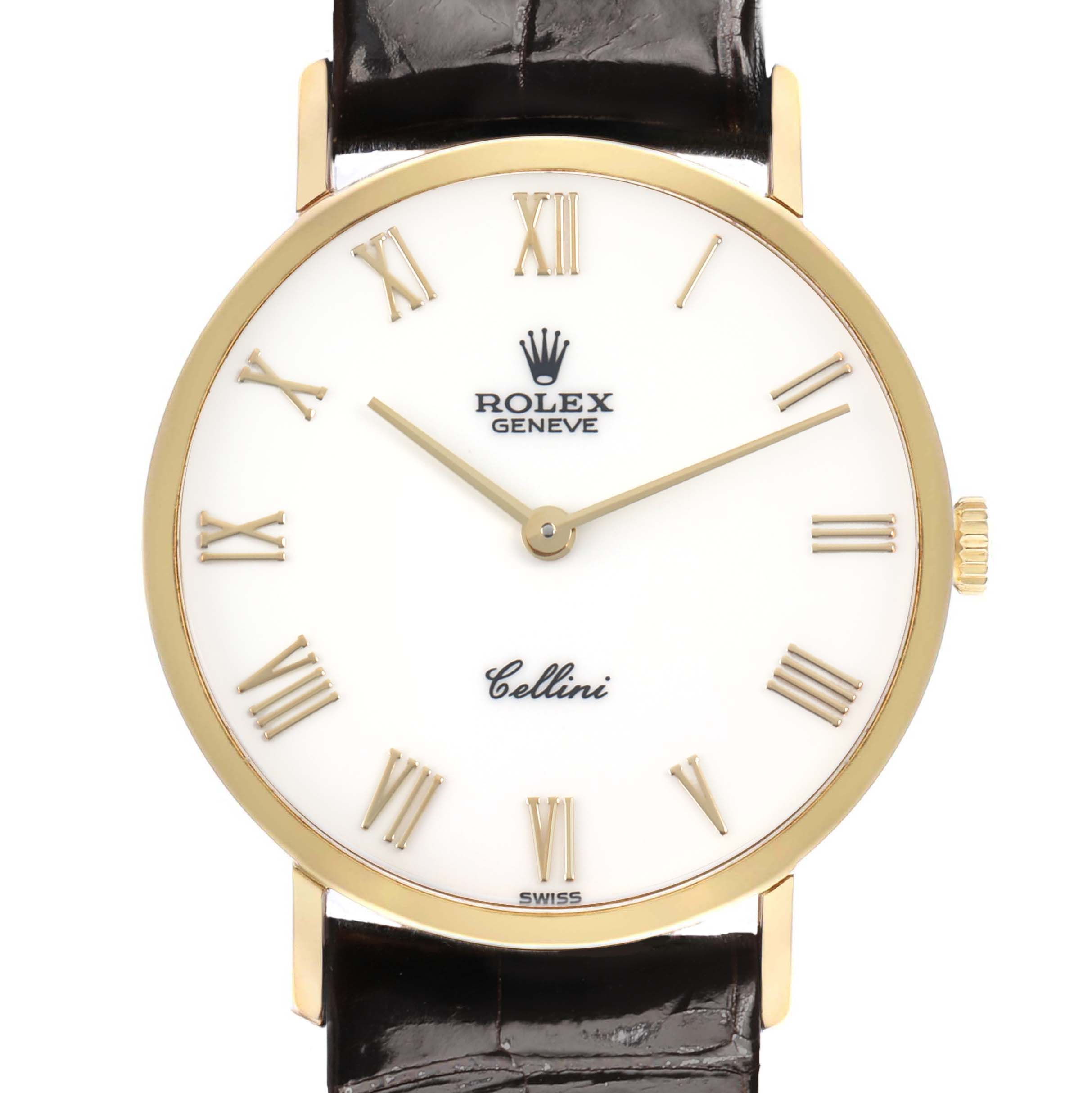 The Rolex Cellini 5112 Men's Yellow Gold White Dial watch is shown from the front, highlighting its white dial, gold case, Roman numerals, and black strap.