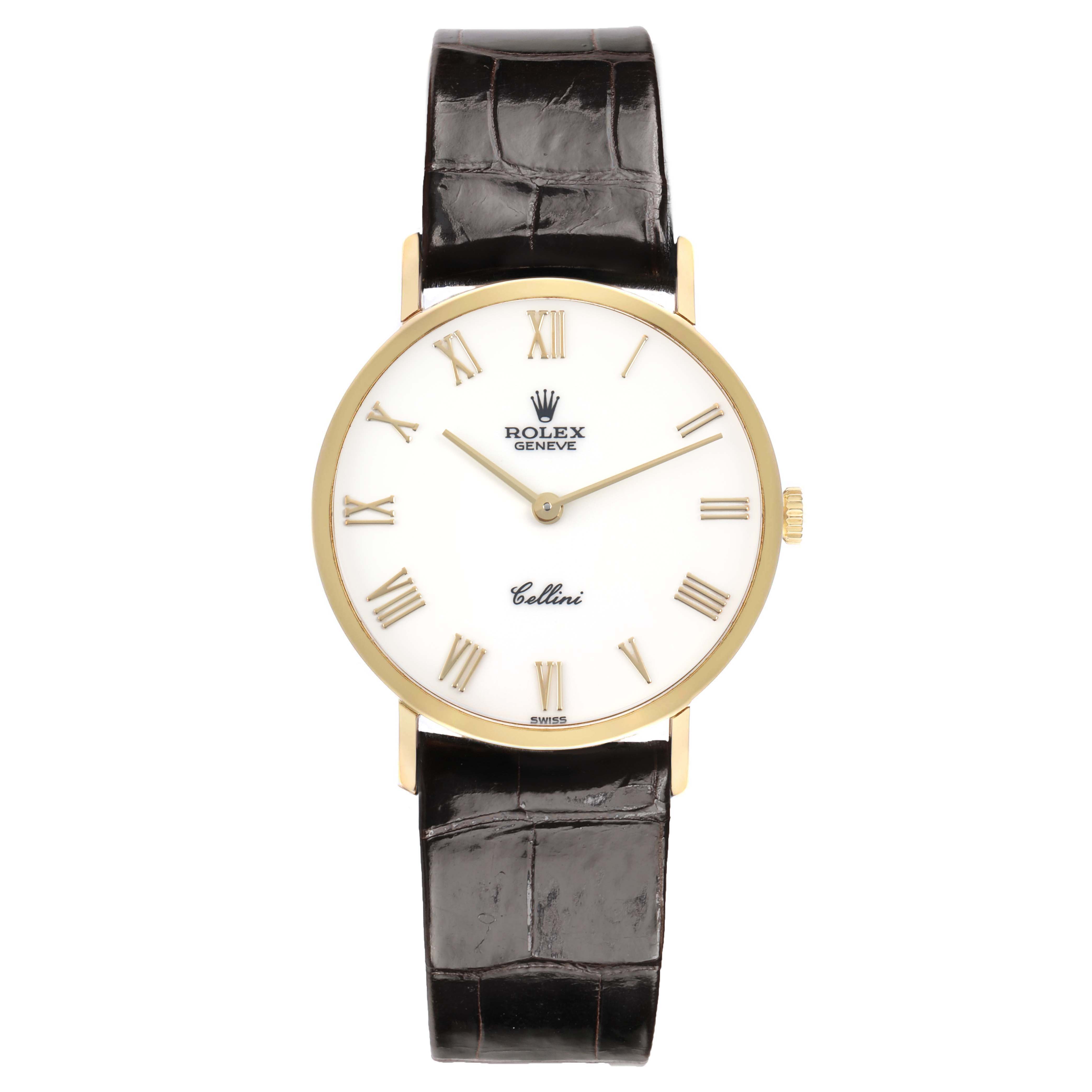 The Rolex Cellini 5112 Men's Yellow Gold White Dial watch is shown from the front, highlighting the dial, hands, Roman numerals, and leather strap.