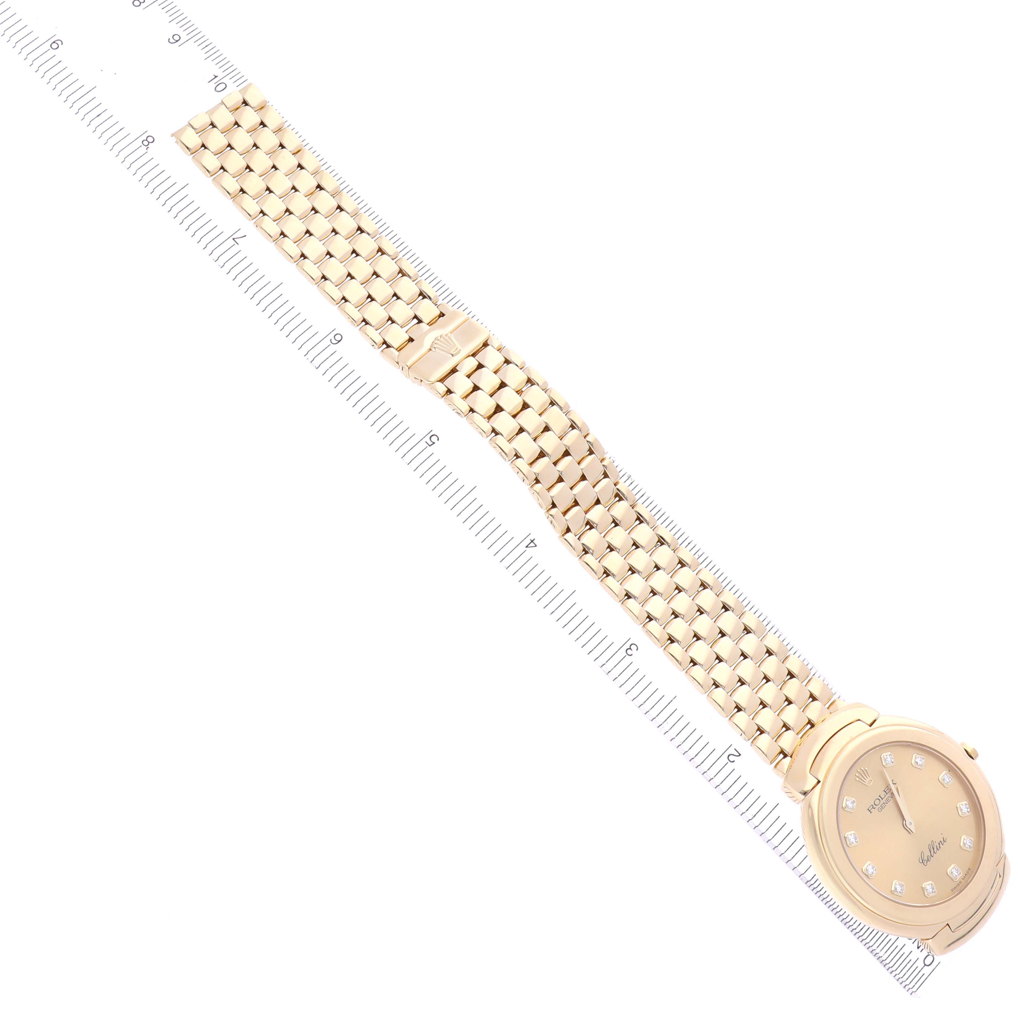 The Rolex Cellini 6623 Men's Yellow Gold Champagne Dial 6623 Men's Yellow Gold Champagne Dial watch is shown from a top-down angle, highlighting the face, bracelet, and clasp.