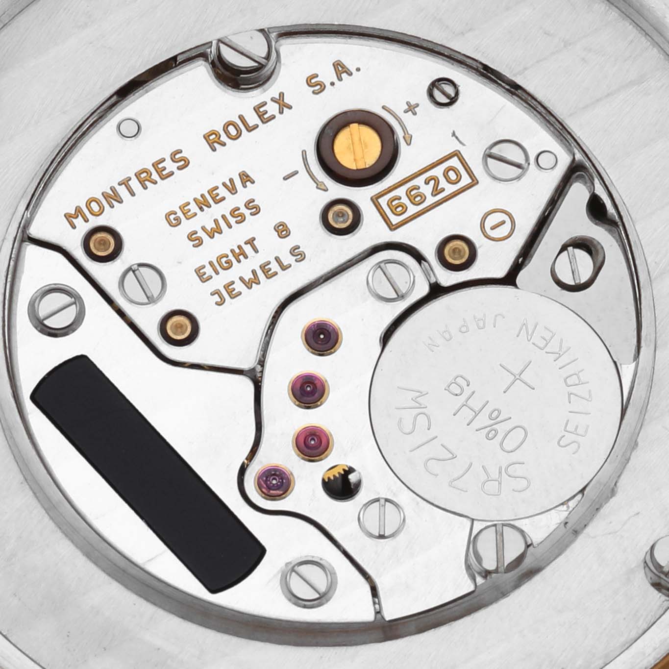 The image shows the movement of a Rolex Cellini 6623 Men's Yellow Gold Champagne Dial 6623 Men's Yellow Gold Champagne Dial watch from a top-down angle, highlighting its internal components and jewel settings.