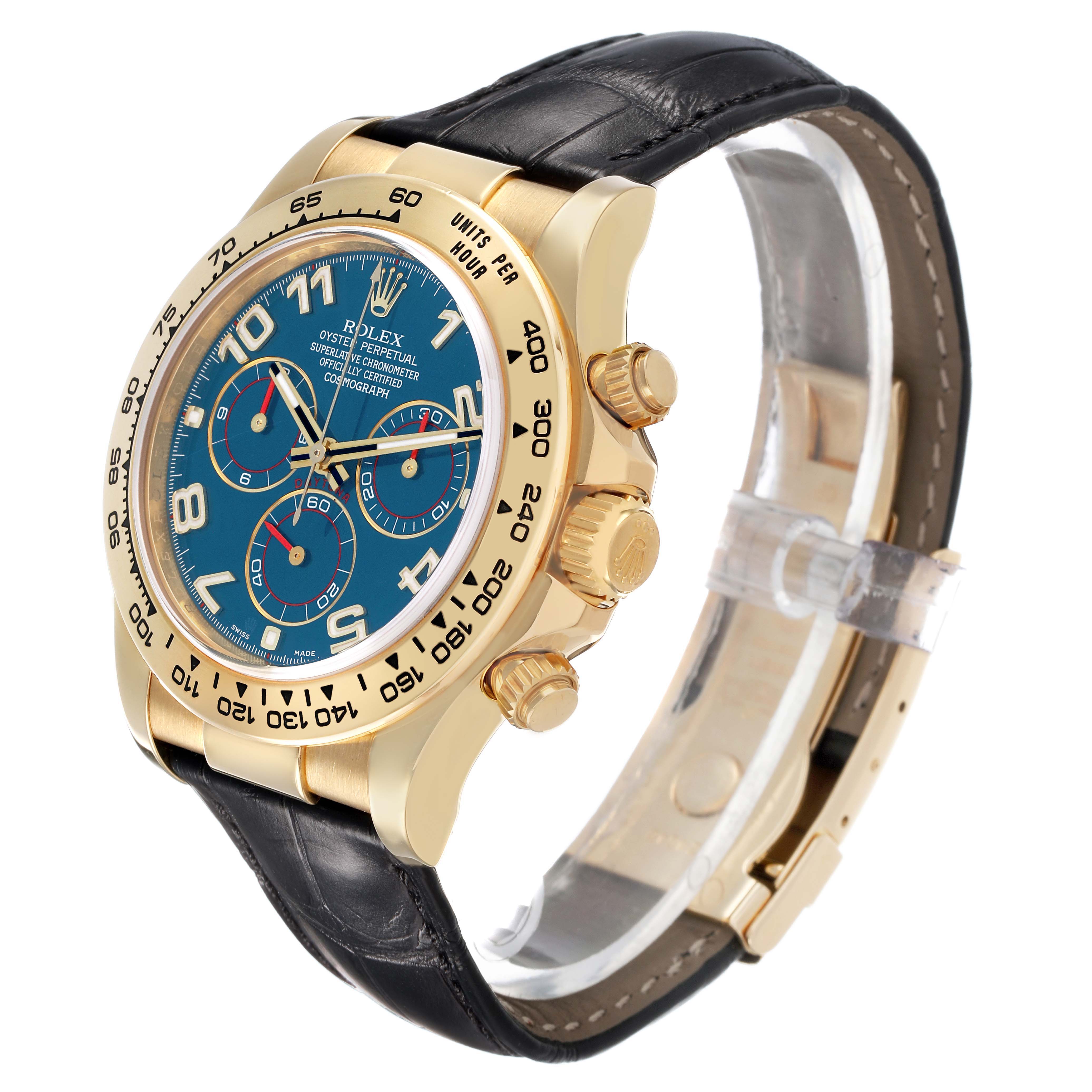 The Rolex Daytona 116518 Men's Yellow Gold Blue Dial watch is shown at a three-quarter angle, highlighting the face, bezel, crown, pushers, and leather strap.
