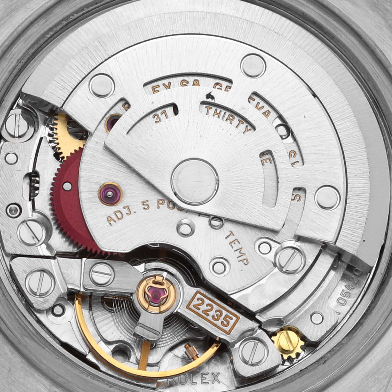 The image shows a close-up of the Rolex Date 79240 Women's Stainless Steel Pink Dial 79240 Women's Stainless Steel Pink Dial model's movement, highlighting the intricate gears and components.