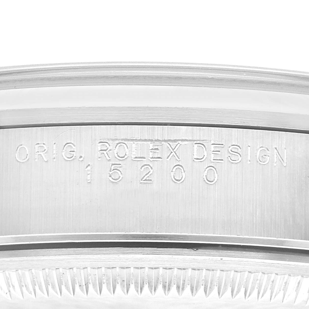 This image shows a close-up of the case side of a Rolex Date 15200 Men's Stainless Steel Silver Dial 15200 Men's Stainless Steel Silver Dial model, displaying the engraving "ORIG. ROLEX DESIGN 15200."