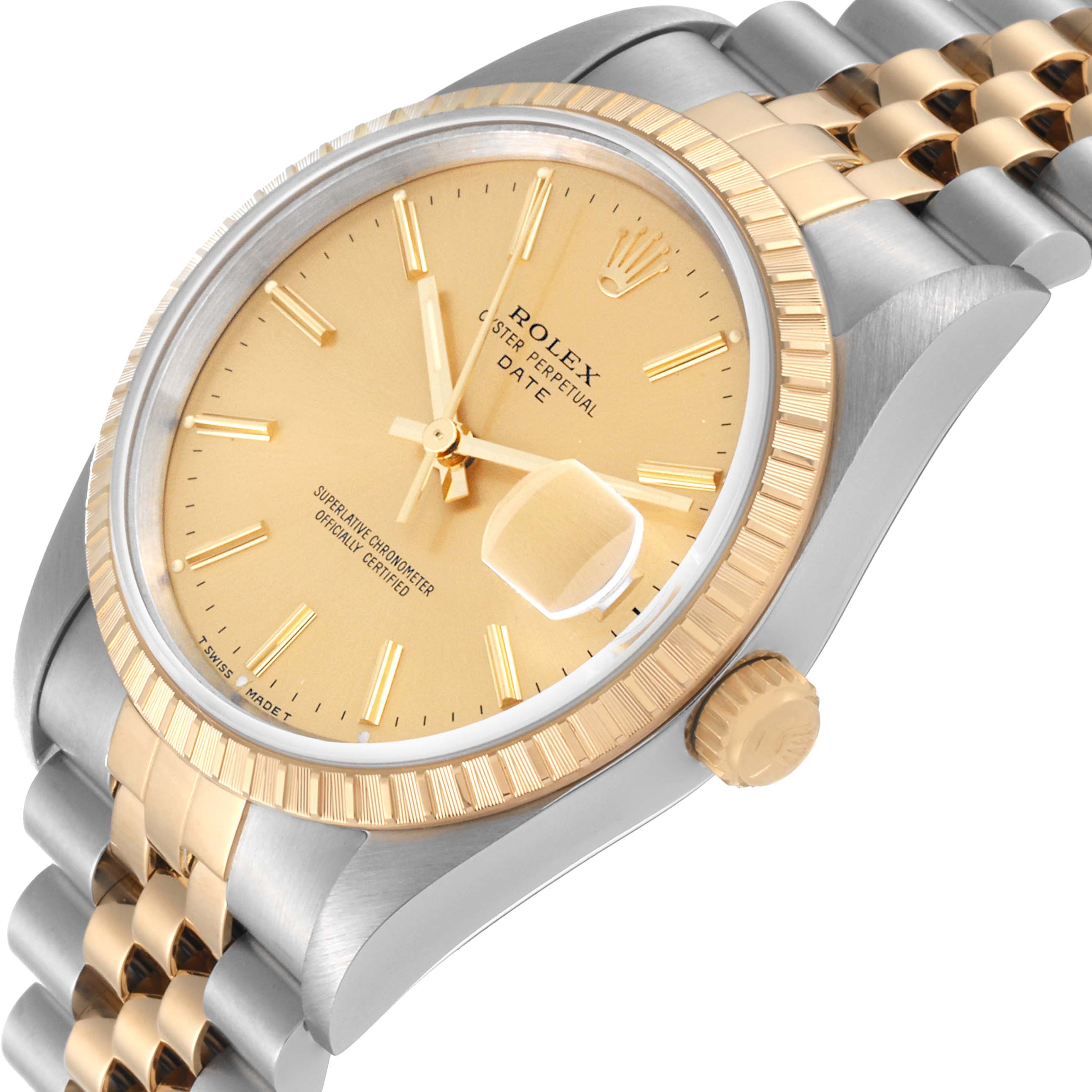 This image shows a close-up view of the Rolex Date 15223 Men's Steel and Gold (two tone) Champagne Dial 15223 Men's Steel and Gold (two tone) Champagne Dial model, highlighting the watch face, bezel, crown, and part of the bracelet.
