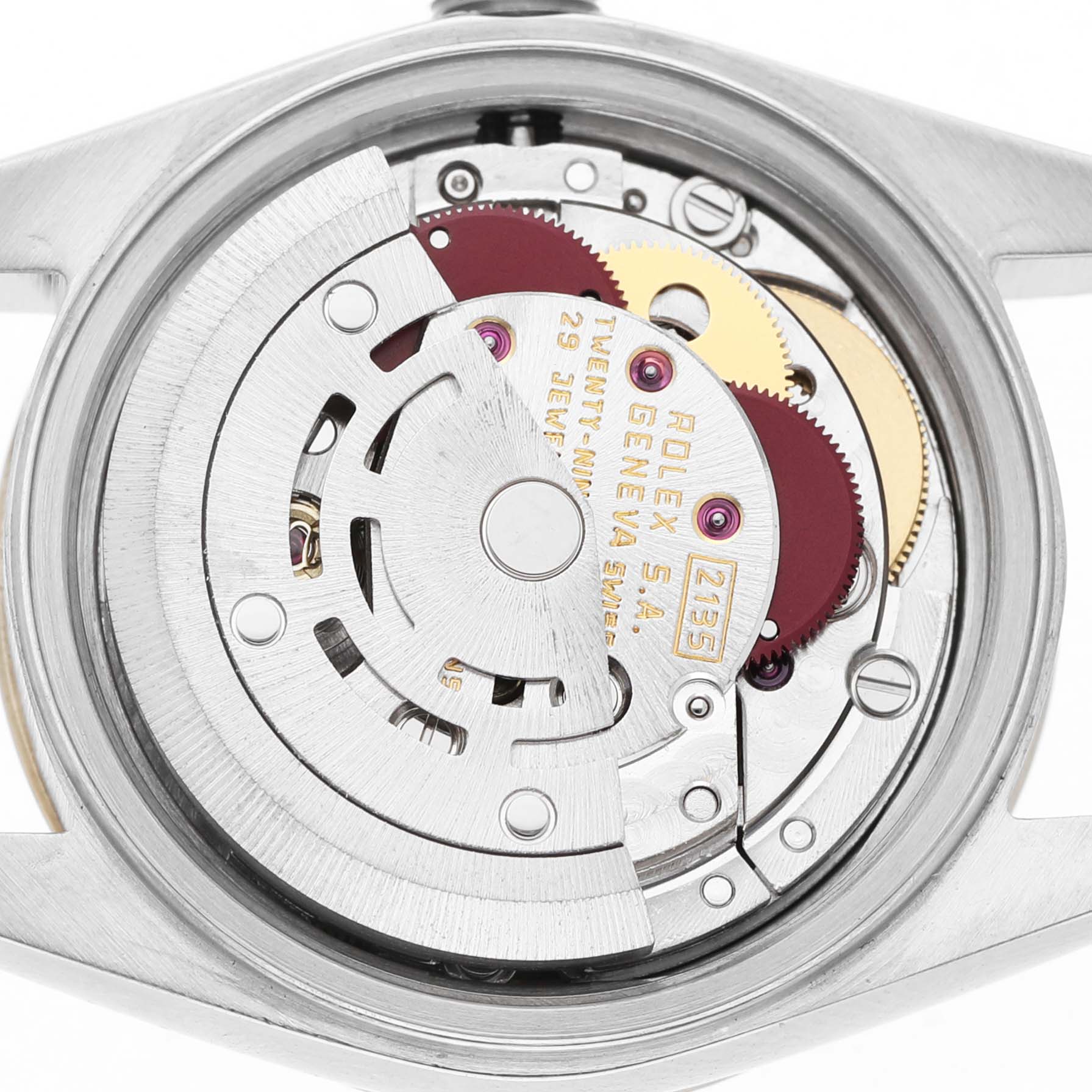 The image shows the movement mechanism of a Rolex Datejust 69173 Women's Steel and Gold (two tone) Champagne Dial watch from the back, highlighting its intricate components.