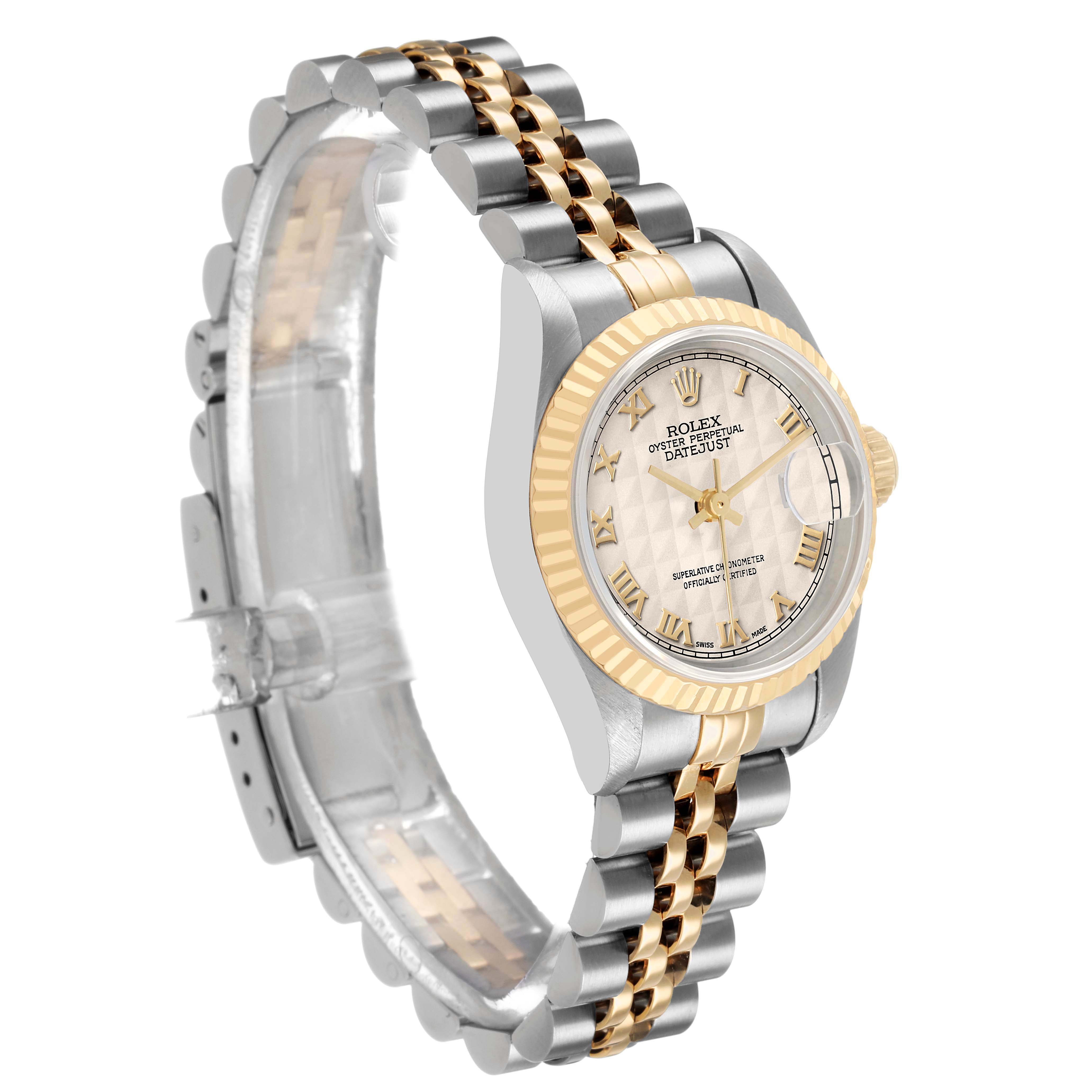 The Rolex Datejust 69173 Women's Steel and Gold (two tone) White Dial watch is shown from a three-quarter angle, highlighting the face, fluted bezel, and two-tone bracelet.