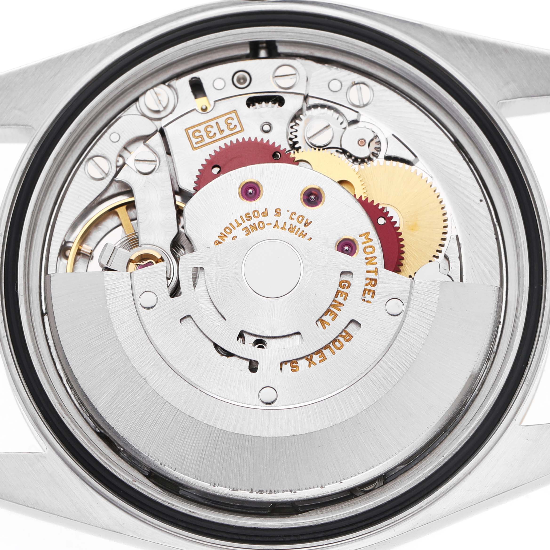The image shows the movement of a Rolex Datejust 41 16233 Men's Steel and Gold (two tone) Beige Dial, highlighting its internal mechanical components from a back view.