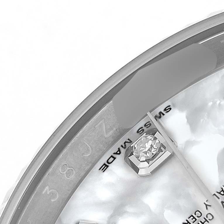 The image shows a close-up of the dial and bezel of a Rolex Datejust 116234 Men's Stainless Steel Mother of Pearl Dial, highlighting the diamond hour marker and "Swiss Made" text.