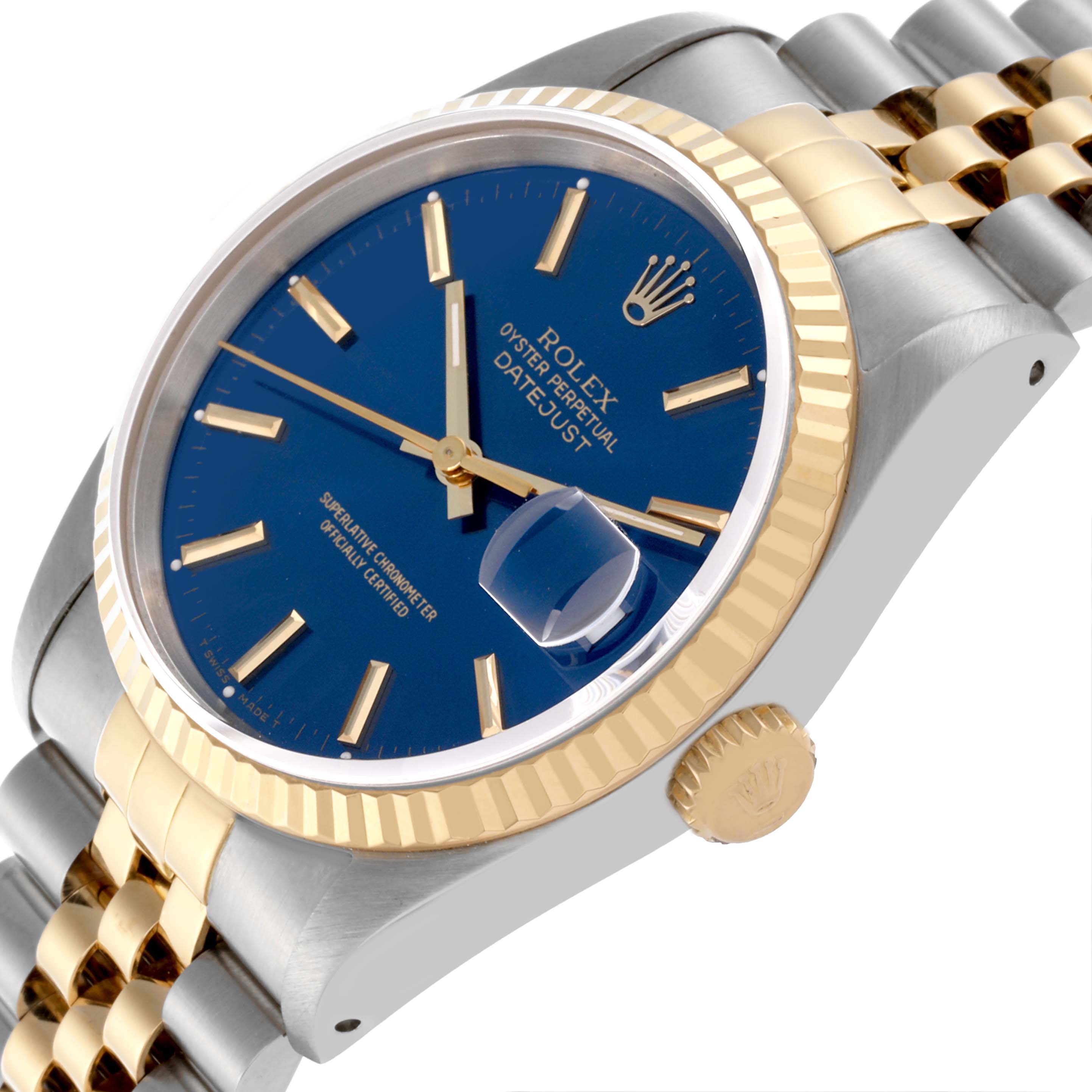 The Rolex Datejust 16233 Men's Steel and Gold (two tone) Blue Dial 16233 Men's Steel and Gold (two tone) Blue Dial watch is shown at a tilted angle displaying its blue dial, gold fluted bezel, crown, and part of the Jubilee bracelet.
