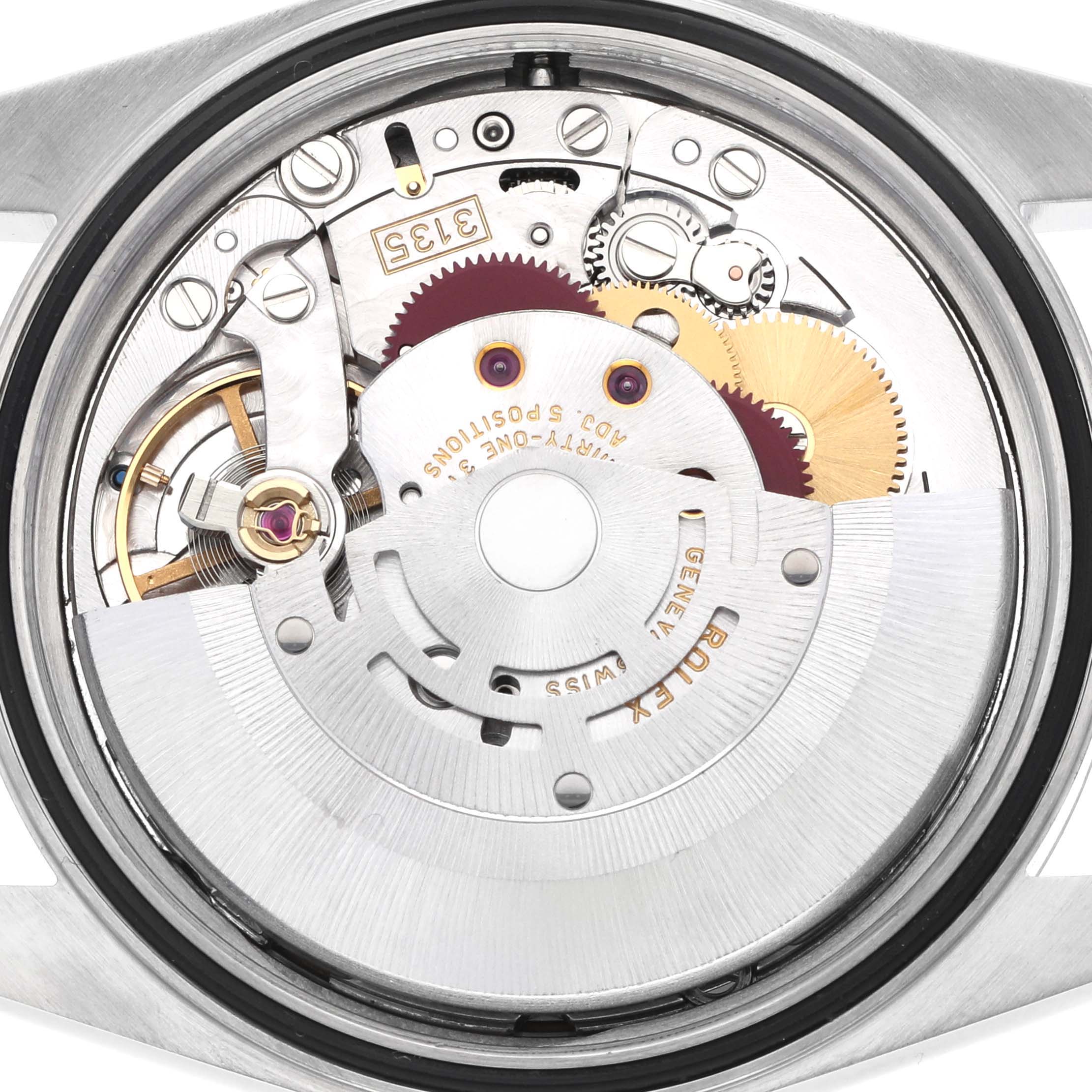 The image shows a detailed view of the Rolex Datejust 16200 Men's Stainless Steel White Dial 16200 Men's Stainless Steel White Dial's movement, highlighting gears and components from a top-down angle.